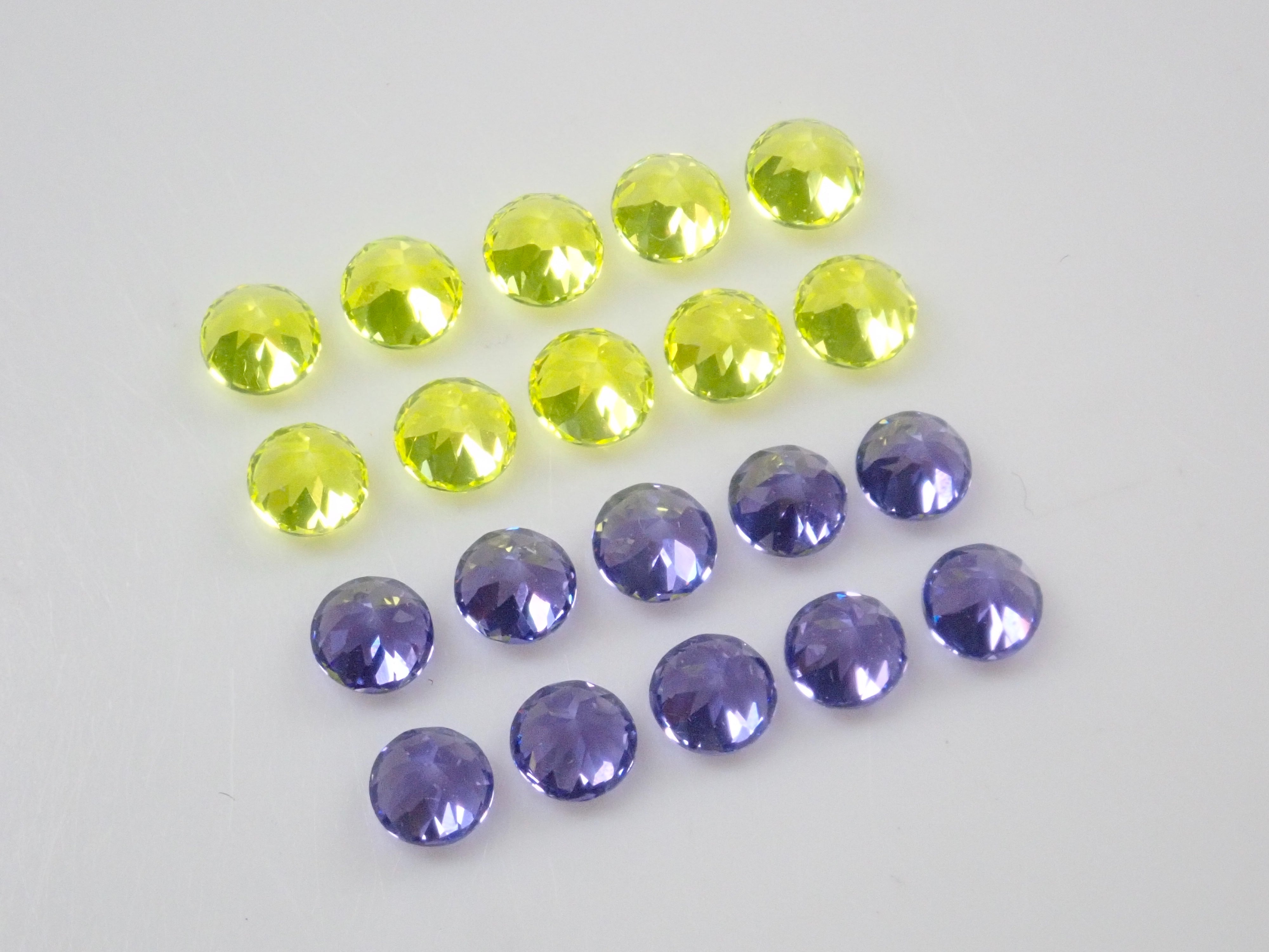 Limited to 10 stones: YAG (Yttrium Aluminum Garnet) 2-stone set (Canary Yellow &amp; Neon Purple, 3mm) Multiple purchase discounts available