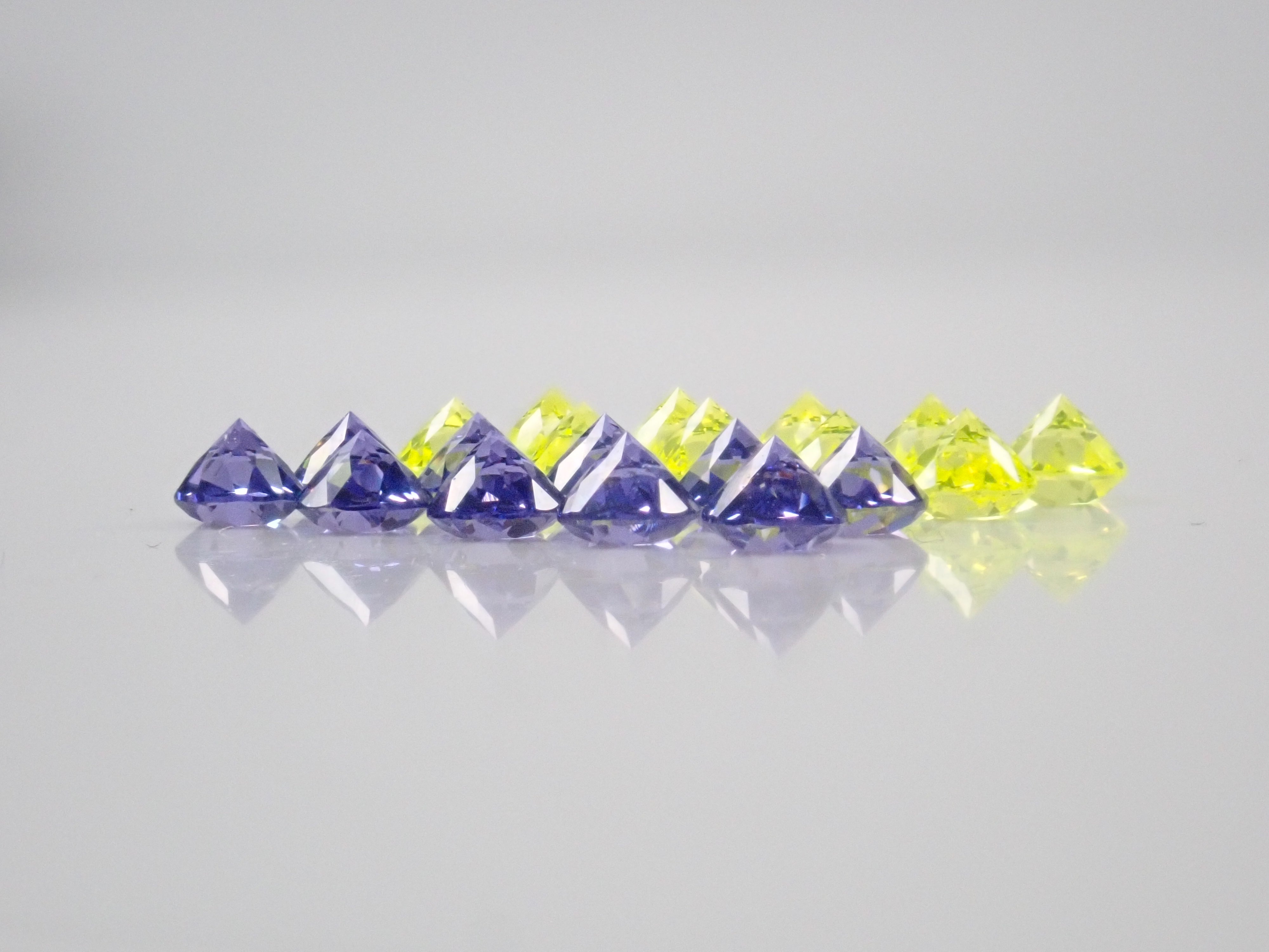 Limited to 10 stones: YAG (Yttrium Aluminum Garnet) 2-stone set (Canary Yellow &amp; Neon Purple, 3mm) Multiple purchase discounts available