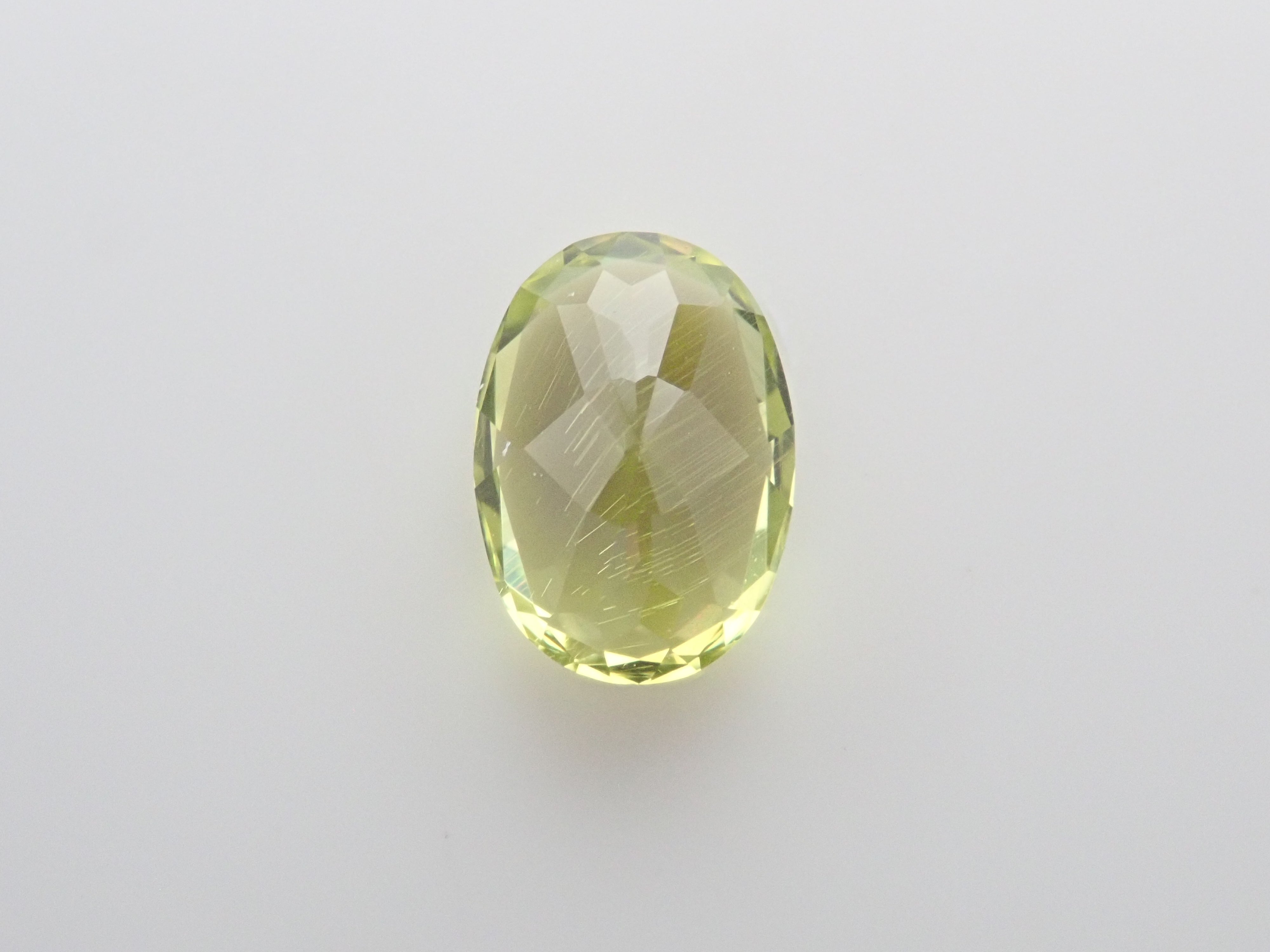 Parasite Peridot (Paracytic Peridot) 0.541ct Loose Japanese-German Edition