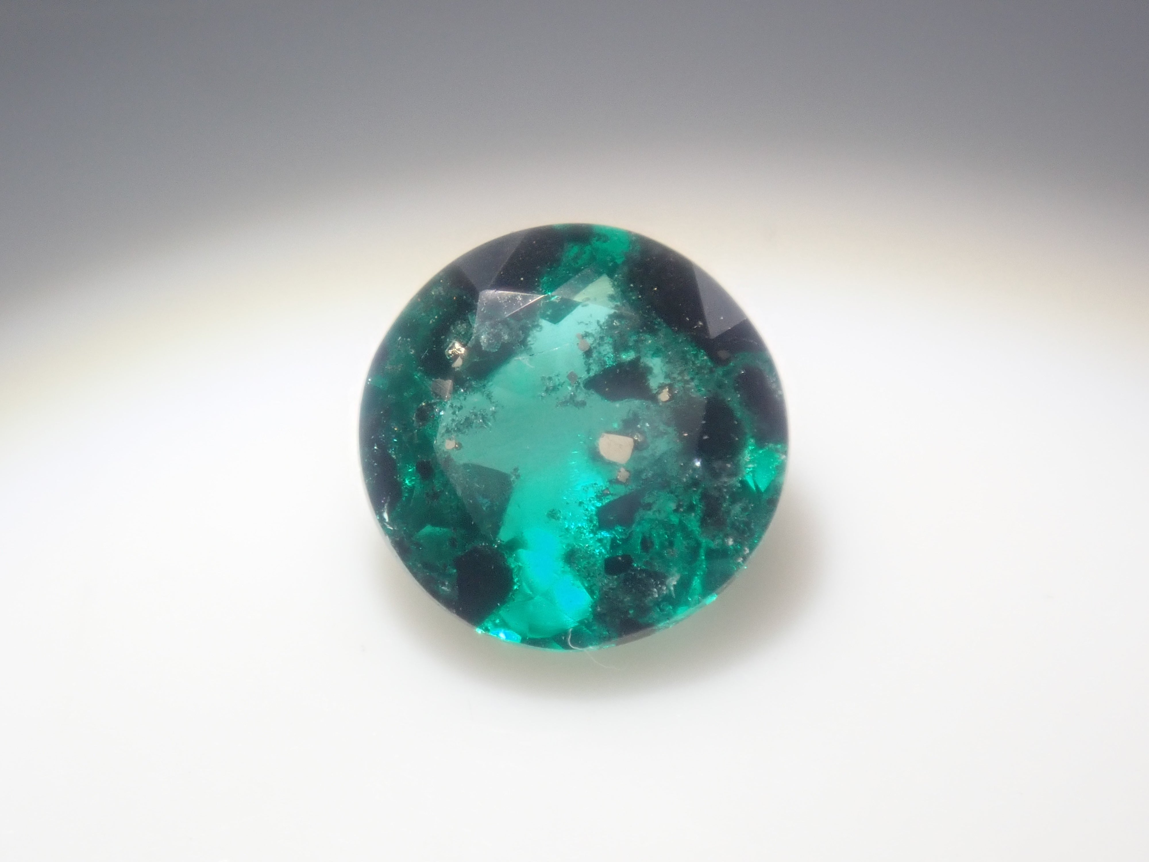 [Item 12563910] Colombian Pyrite and Mica in Emerald, 0.360 ct Loose Stone