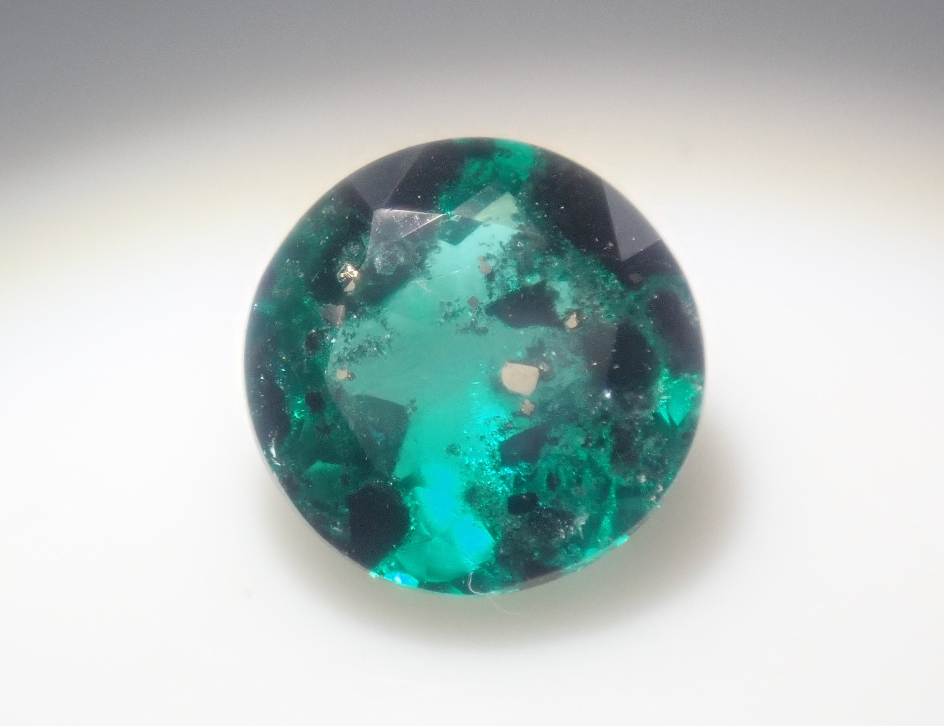 [Item 12563910] Colombian Pyrite and Mica in Emerald, 0.360 ct Loose Stone