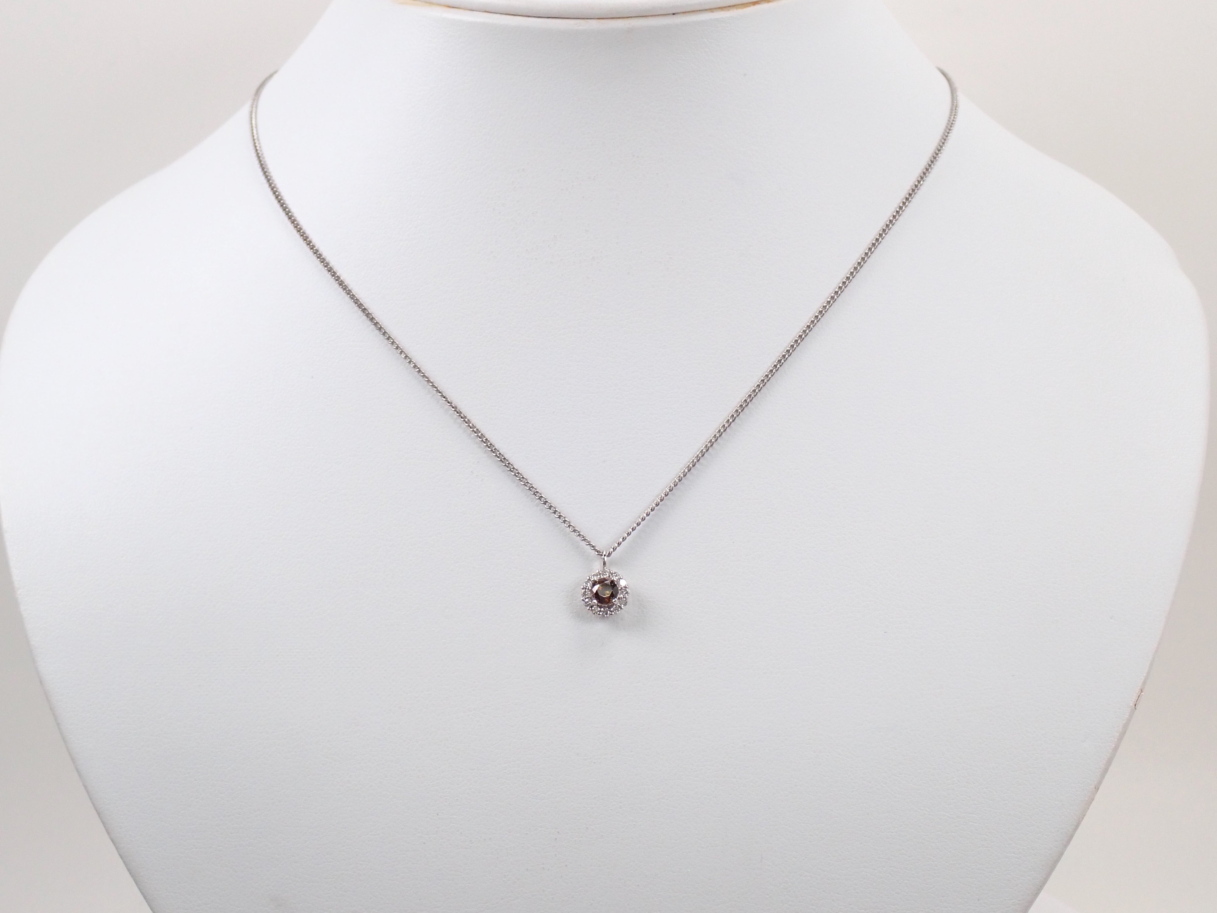 【抽選販売0812_03】Pt900 中国・雲南省産キャシテライト 4mm/0.57ct ・ダイヤモンド0.16ctペンダントトップ（ネックレストップ）鑑別書