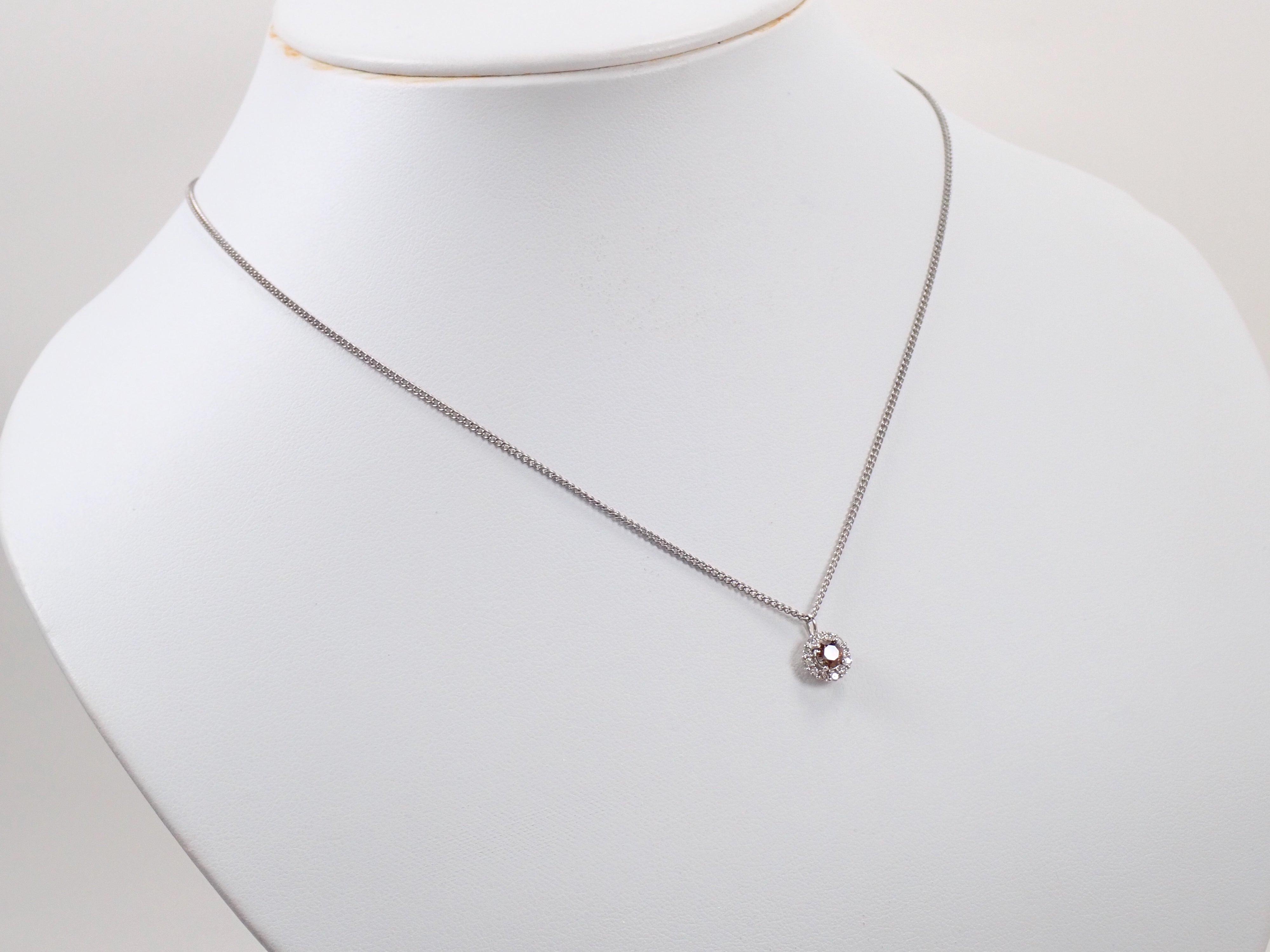 【抽選販売0812_03】Pt900 中国・雲南省産キャシテライト 4mm/0.57ct ・ダイヤモンド0.16ctペンダントトップ（ネックレストップ）鑑別書