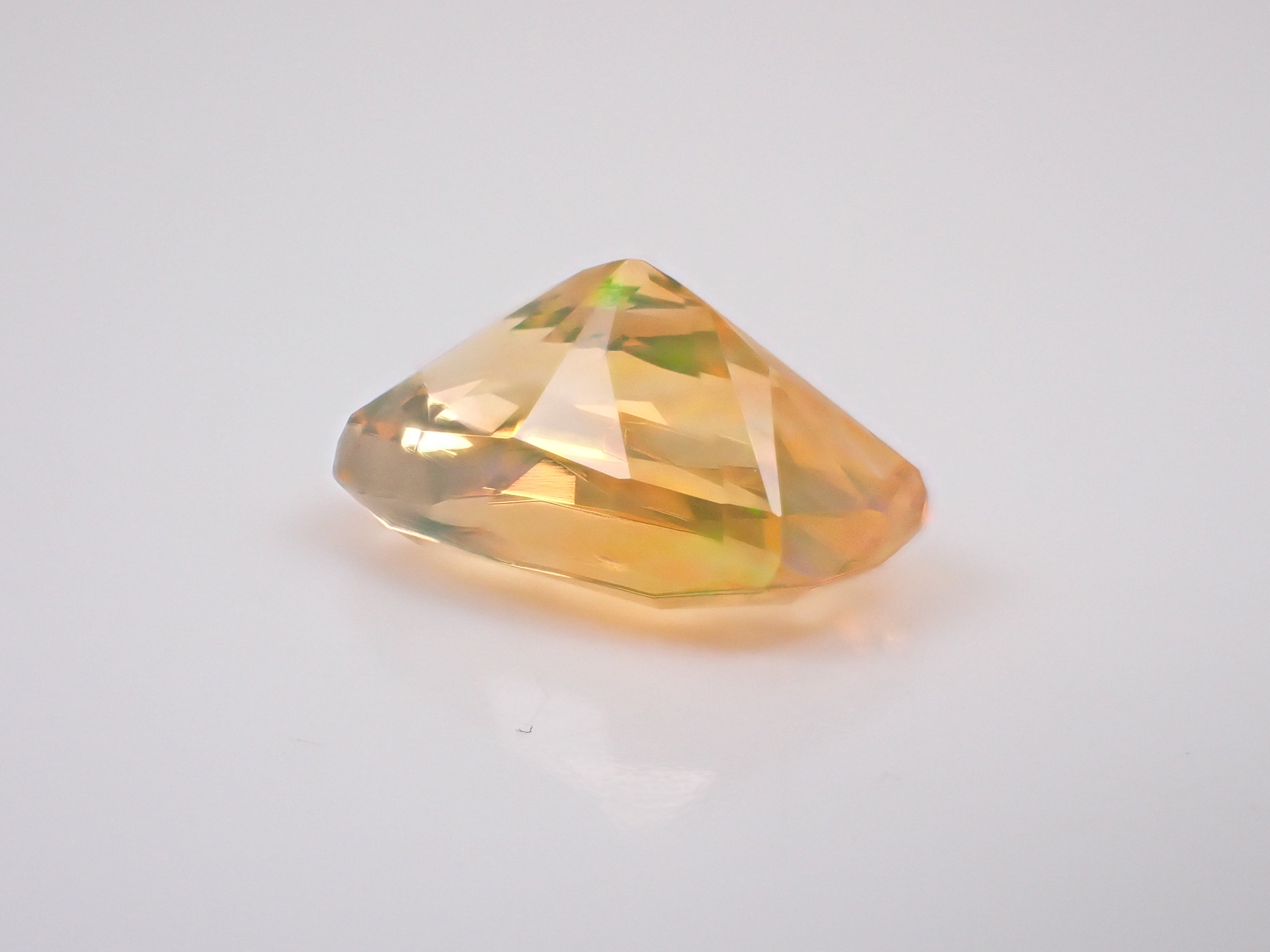 【12562970掲載】メキシコ産ファイアオパール（ファセットカット） 1.255ctルース