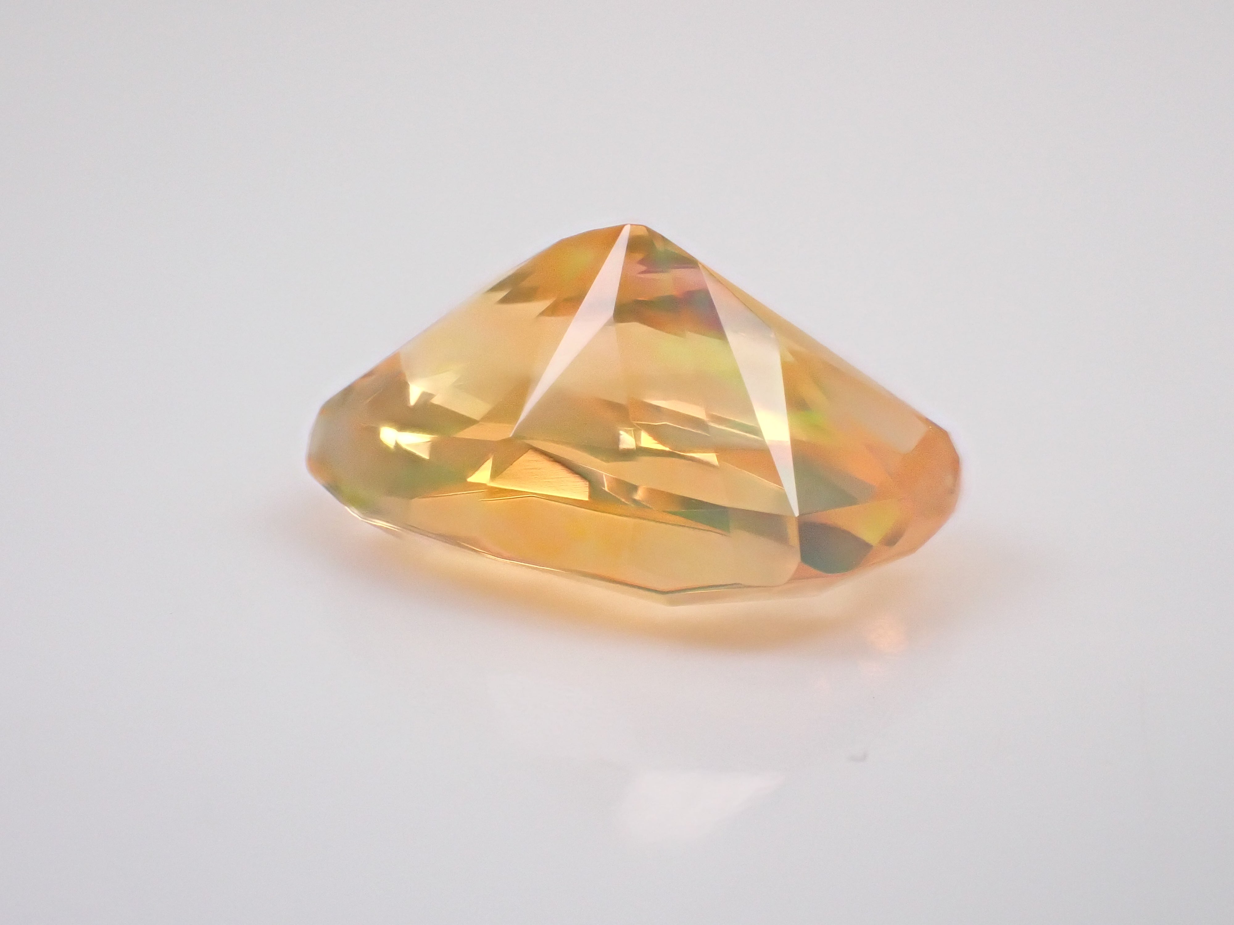 【12562970掲載】メキシコ産ファイアオパール（ファセットカット） 1.255ctルース