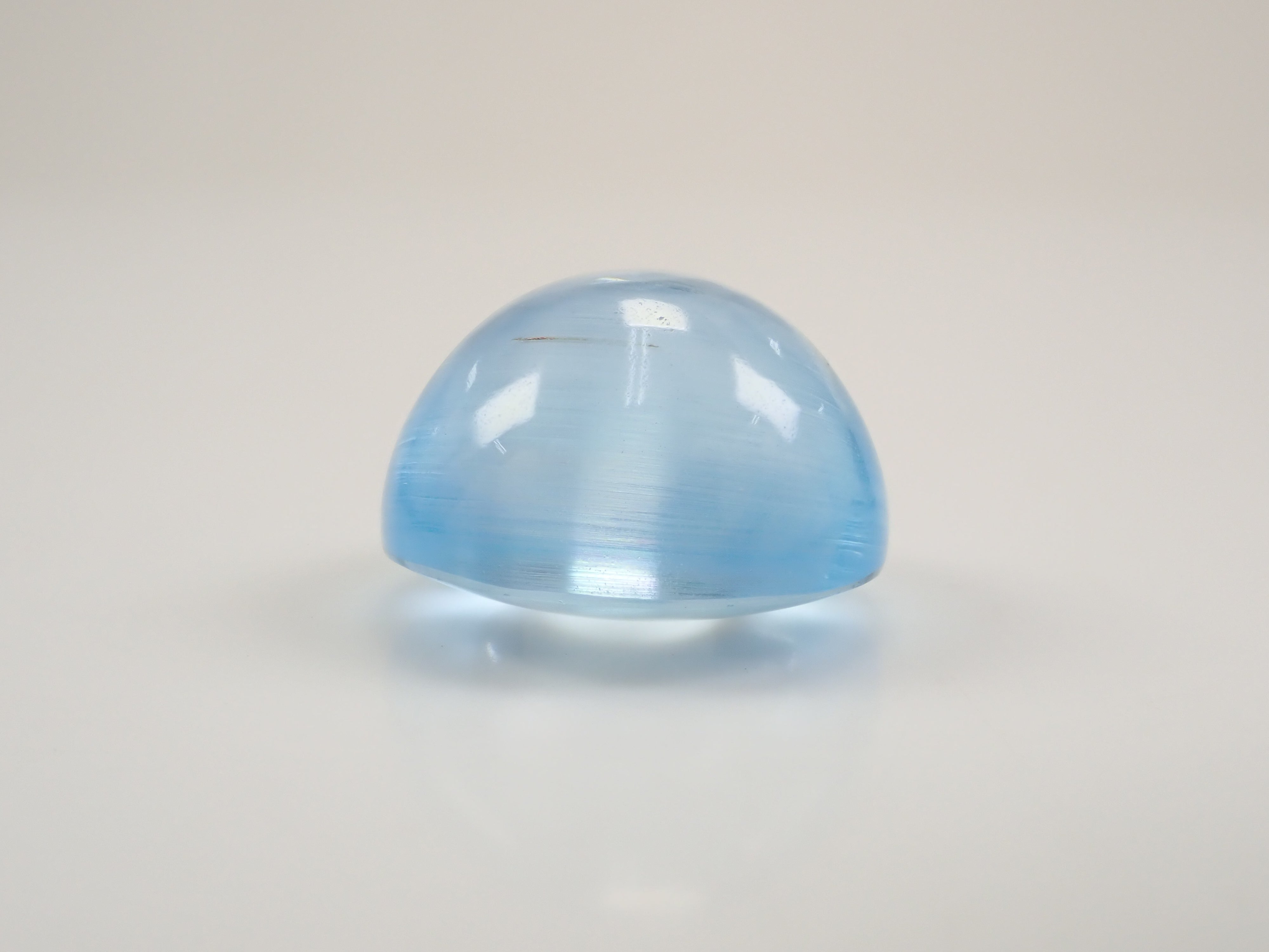 【12560374掲載】ブルートパーズキャッツアイ 22.761ctルース