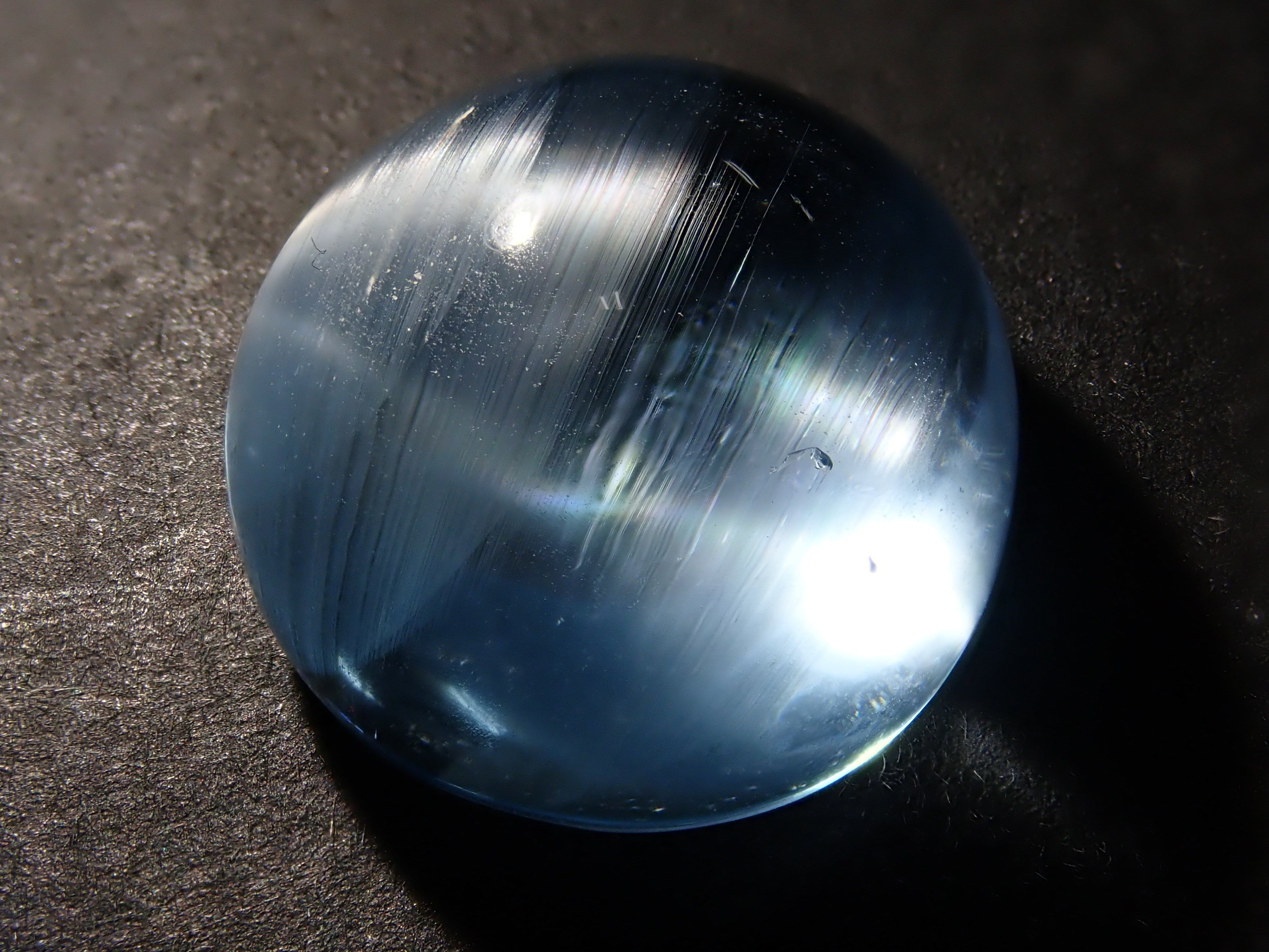 【12560374掲載】ブルートパーズキャッツアイ 22.761ctルース