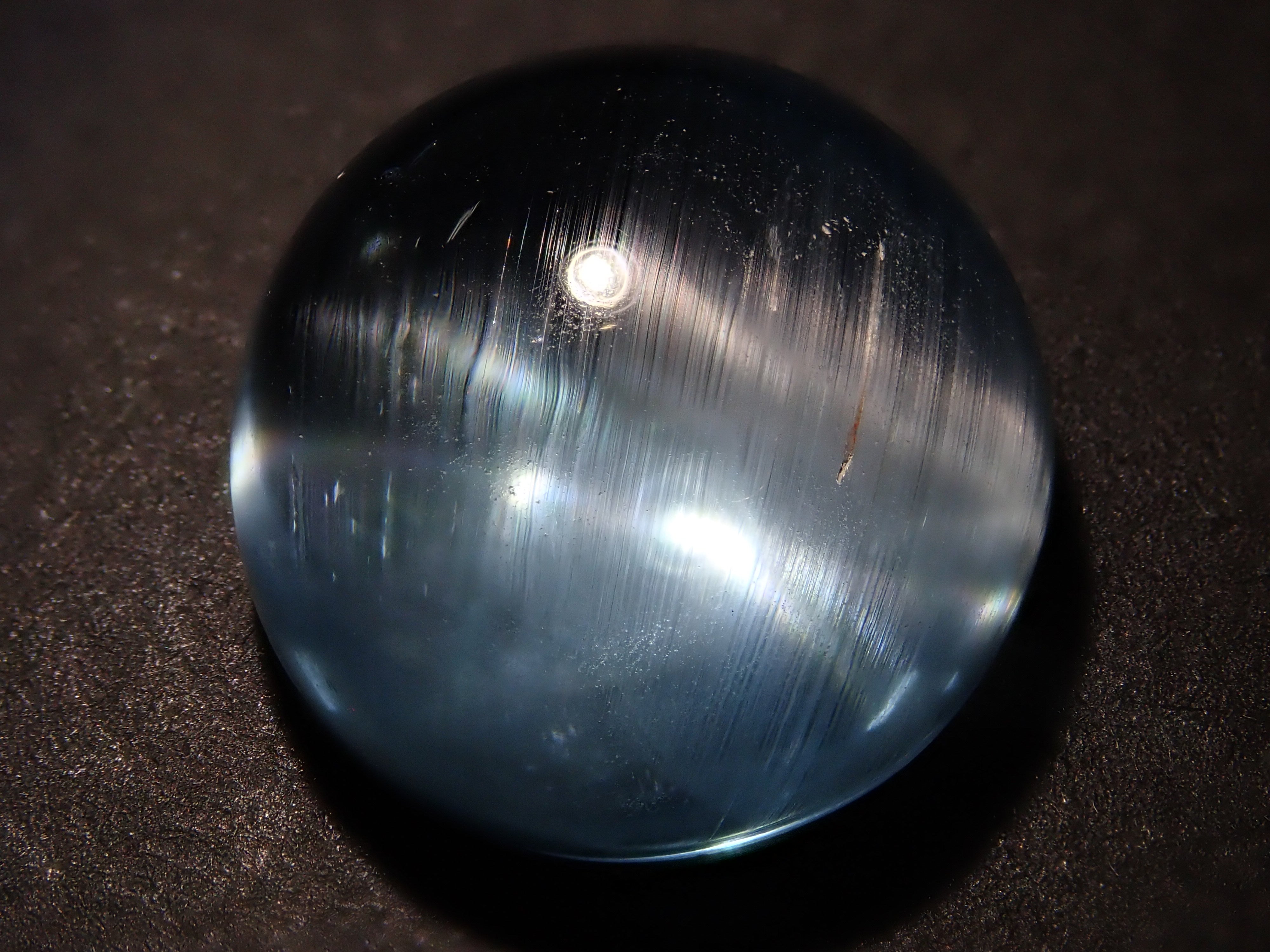 【12560374掲載】ブルートパーズキャッツアイ 22.761ctルース