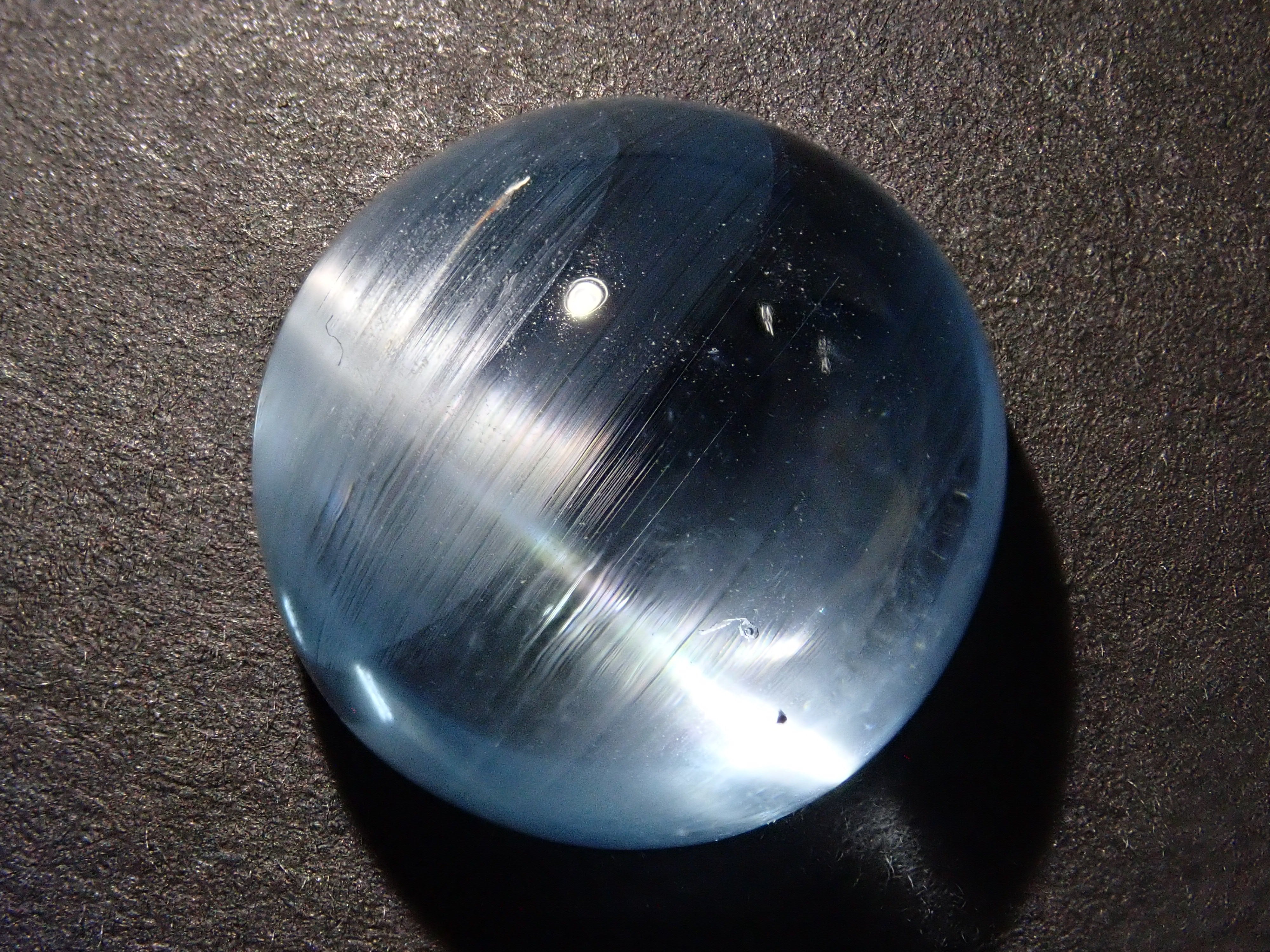 【12560374掲載】ブルートパーズキャッツアイ 22.761ctルース