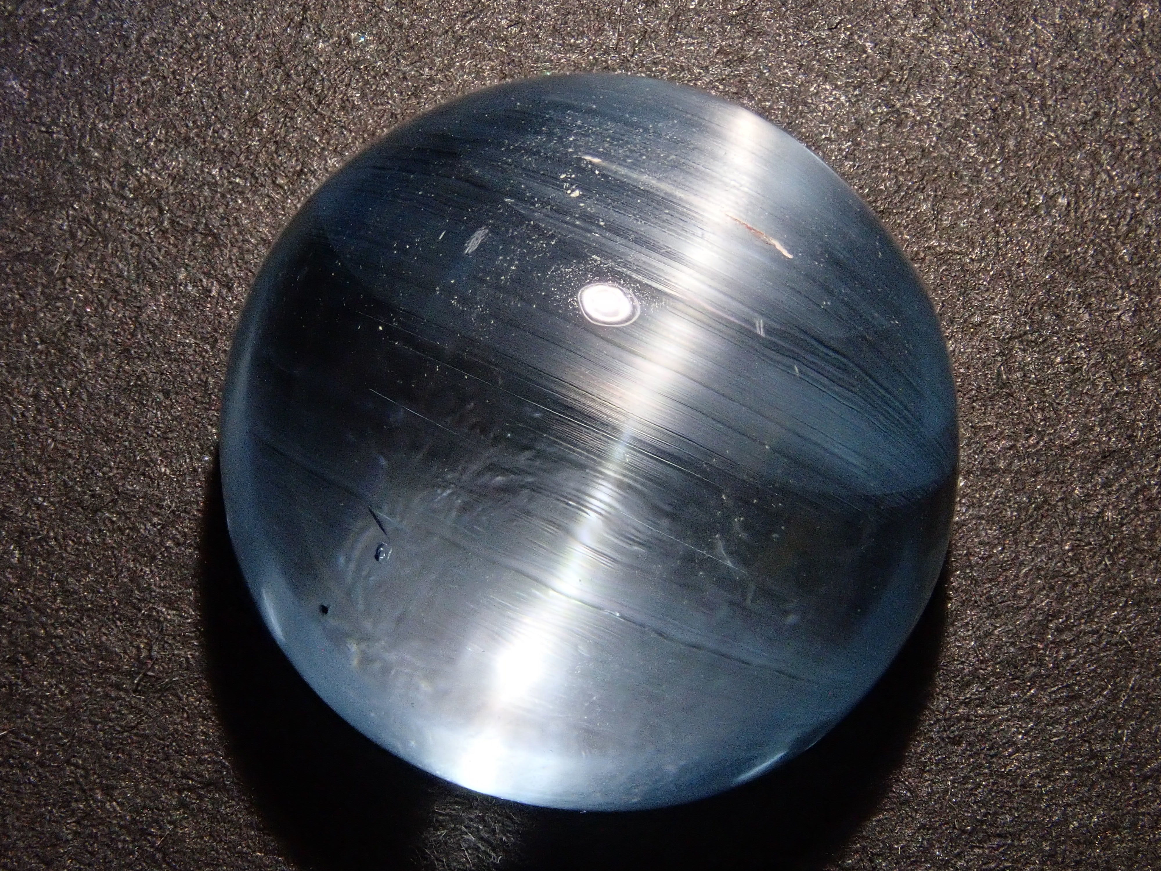 【12560374掲載】ブルートパーズキャッツアイ 22.761ctルース