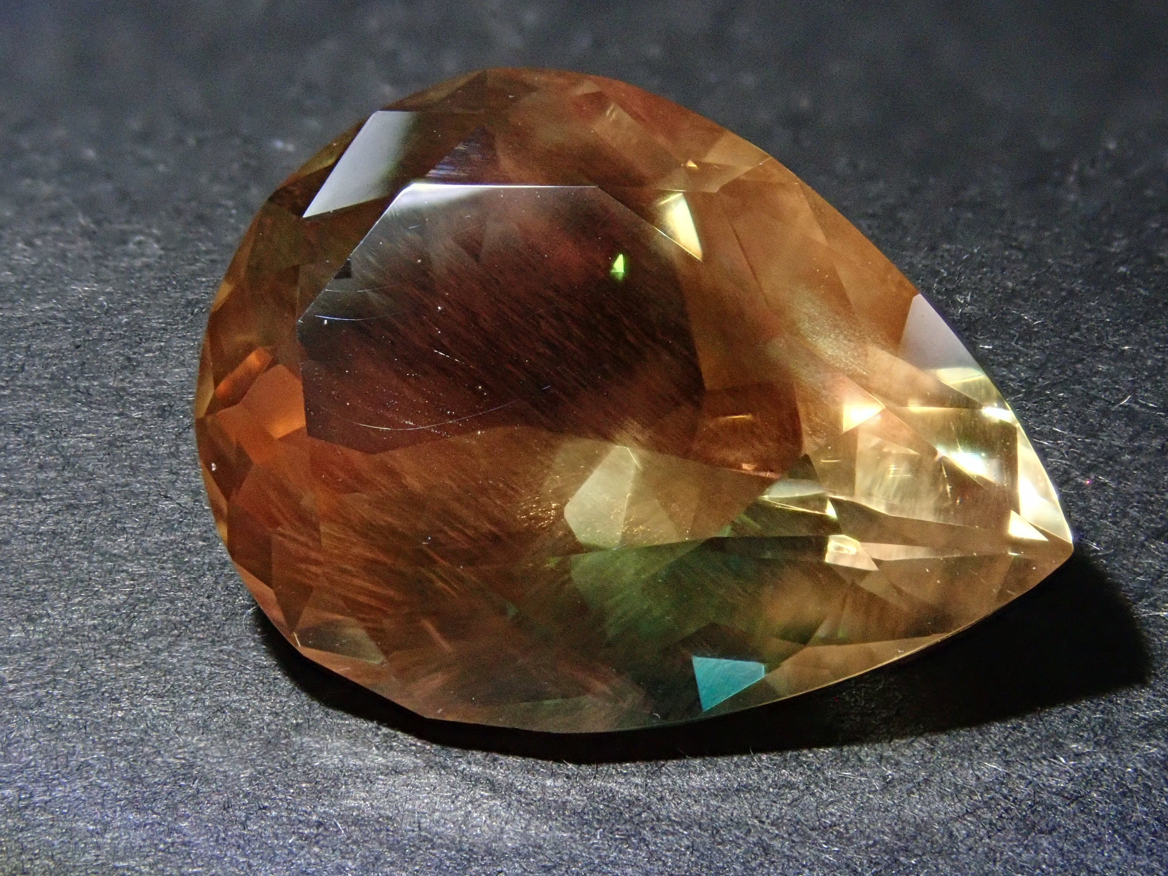 【12560346掲載】アメリカ産オレゴンサンストーン 8.338ctルース