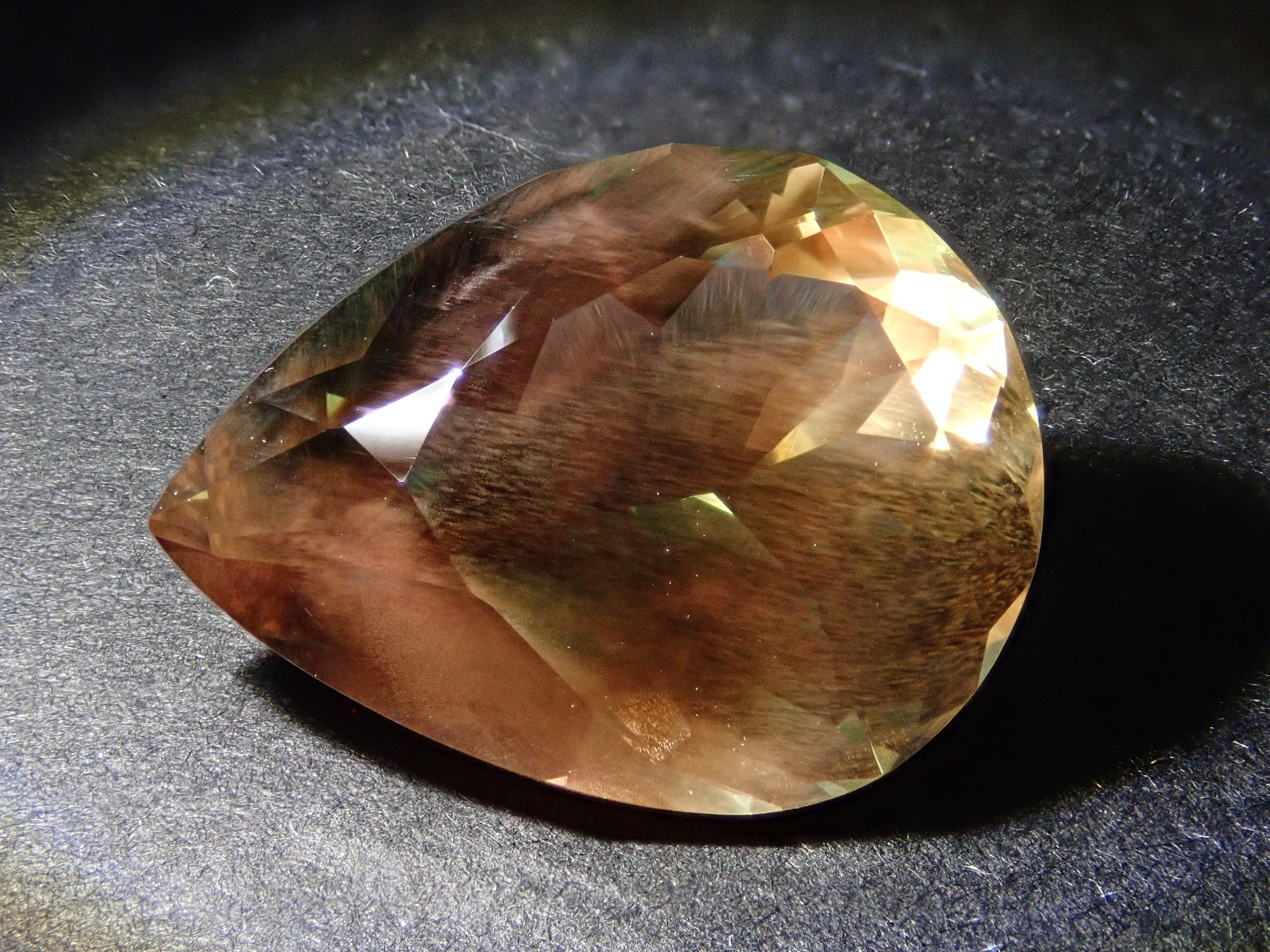 【12560346掲載】アメリカ産オレゴンサンストーン 8.338ctルース