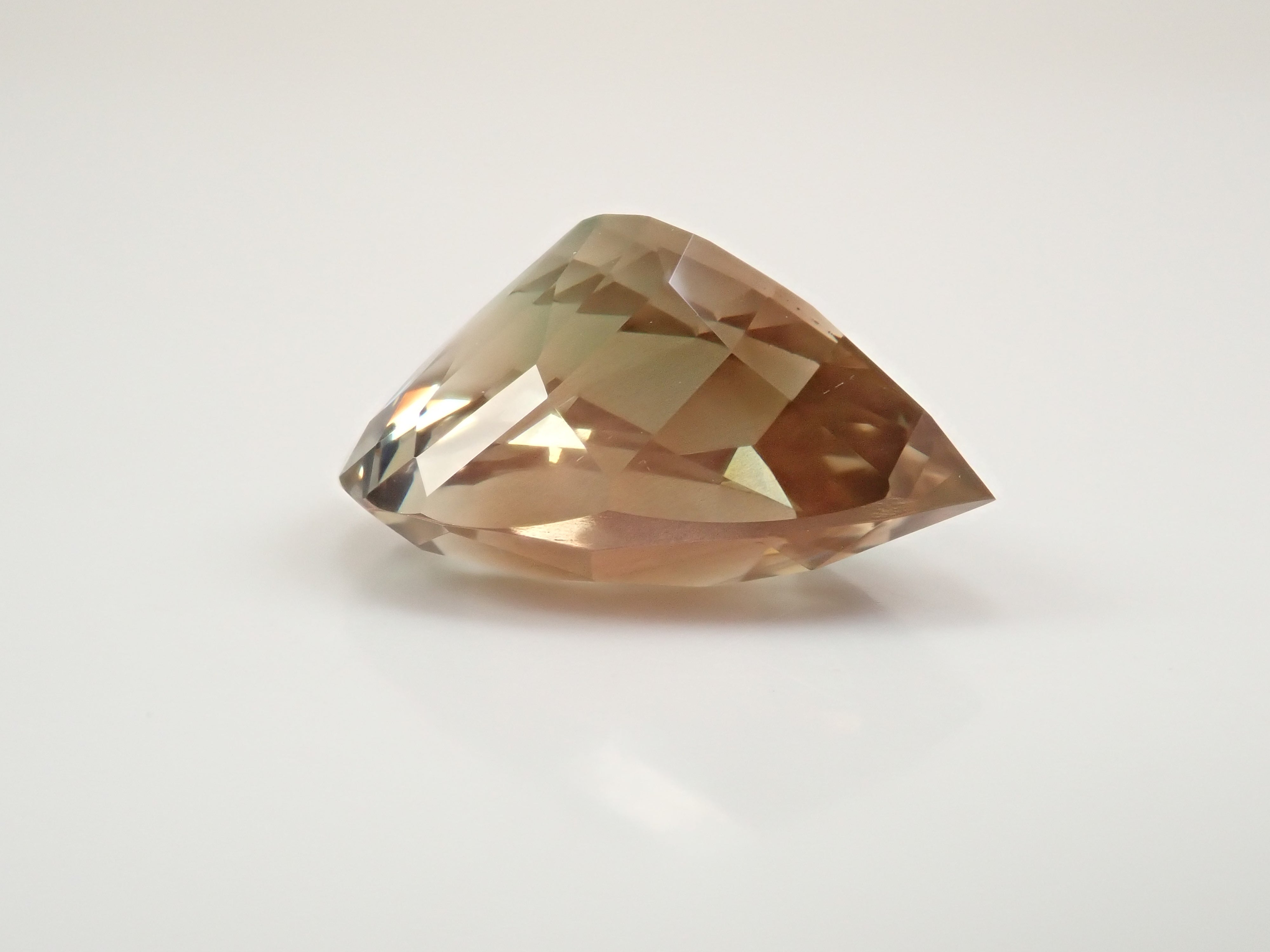 【12560346掲載】アメリカ産オレゴンサンストーン 8.338ctルース