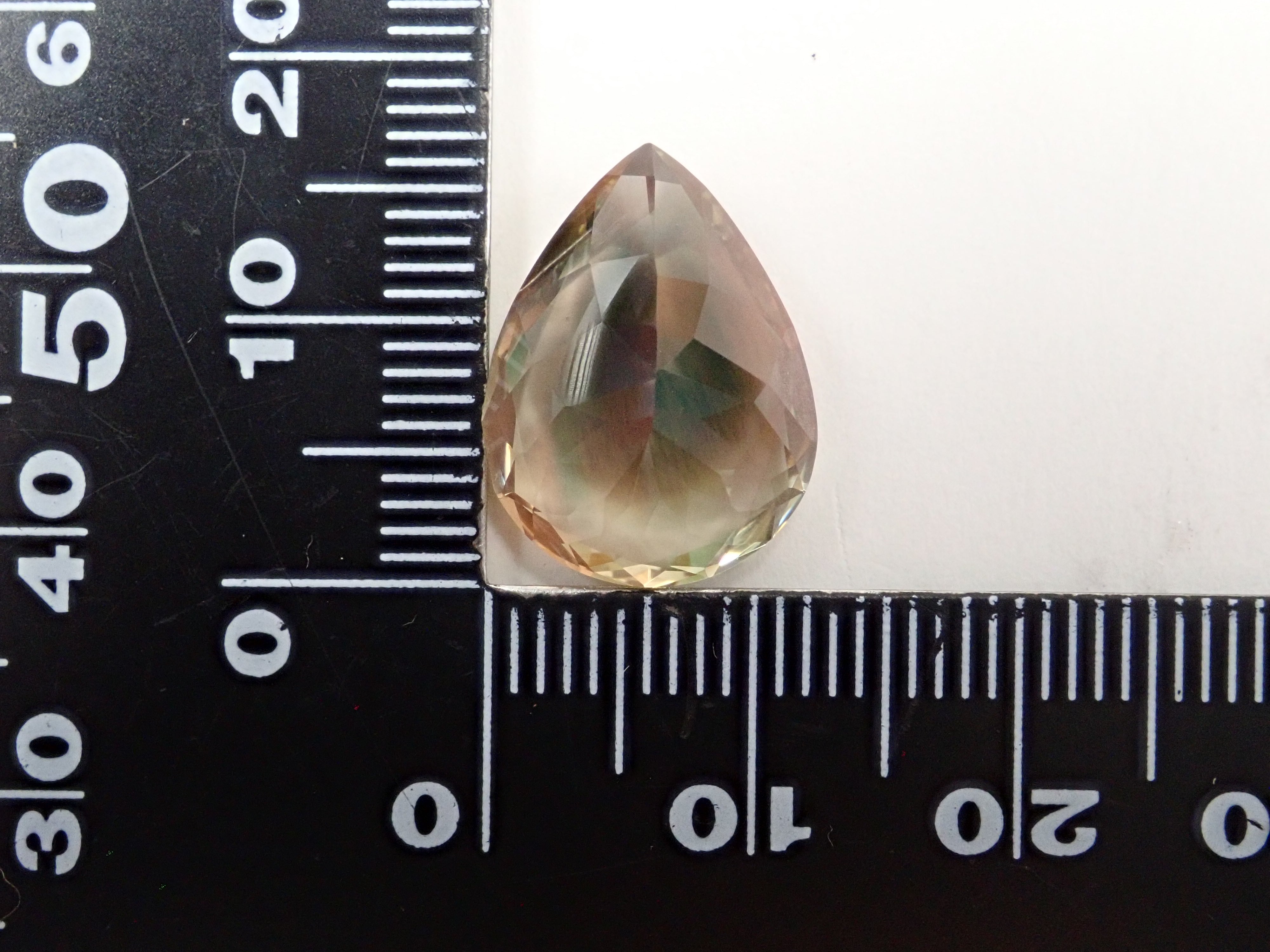 【12560346掲載】アメリカ産オレゴンサンストーン 8.338ctルース