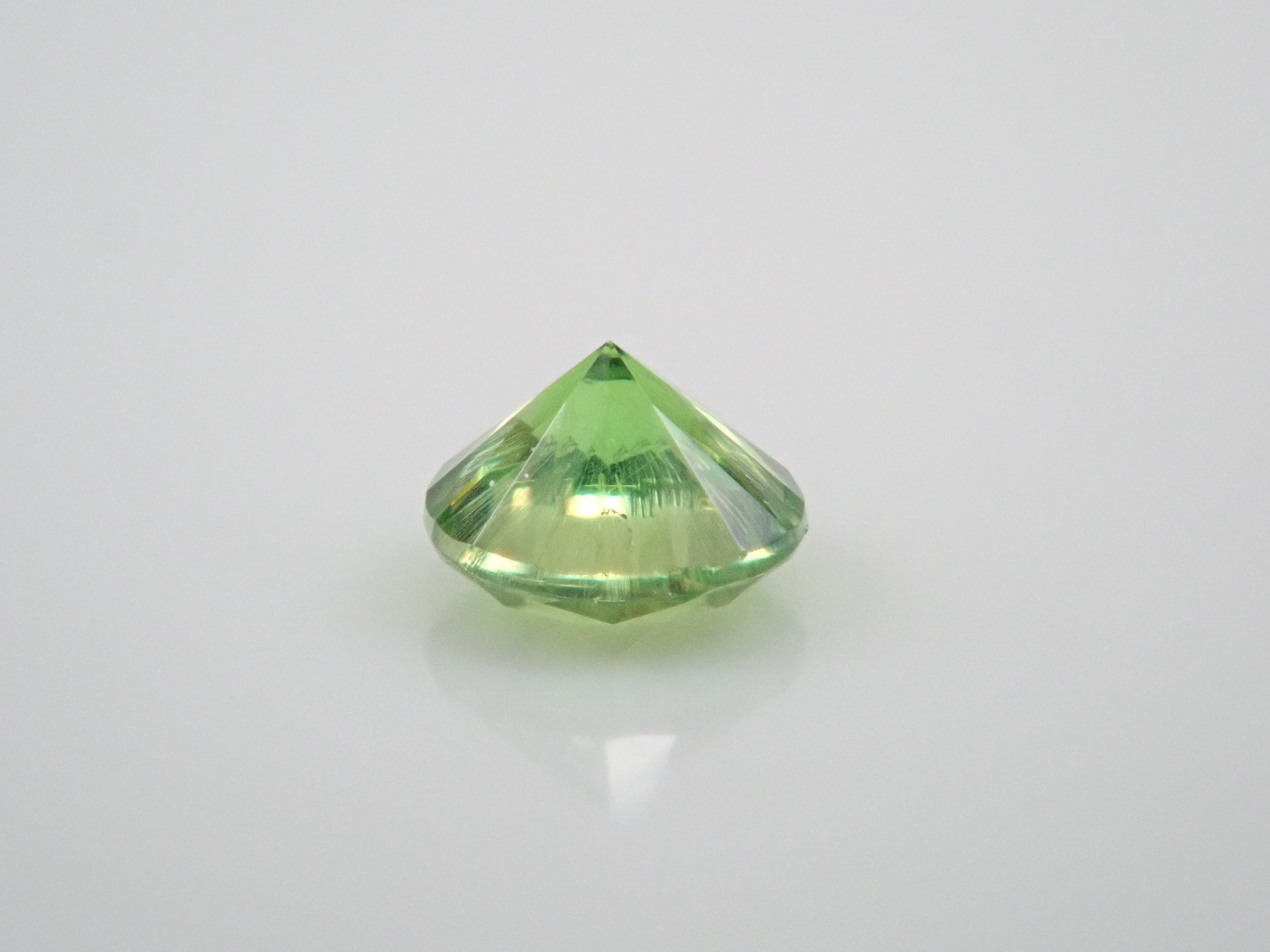 Russian demantoid garnet (horsetail recognized) 2.3mm/0.078ct loose