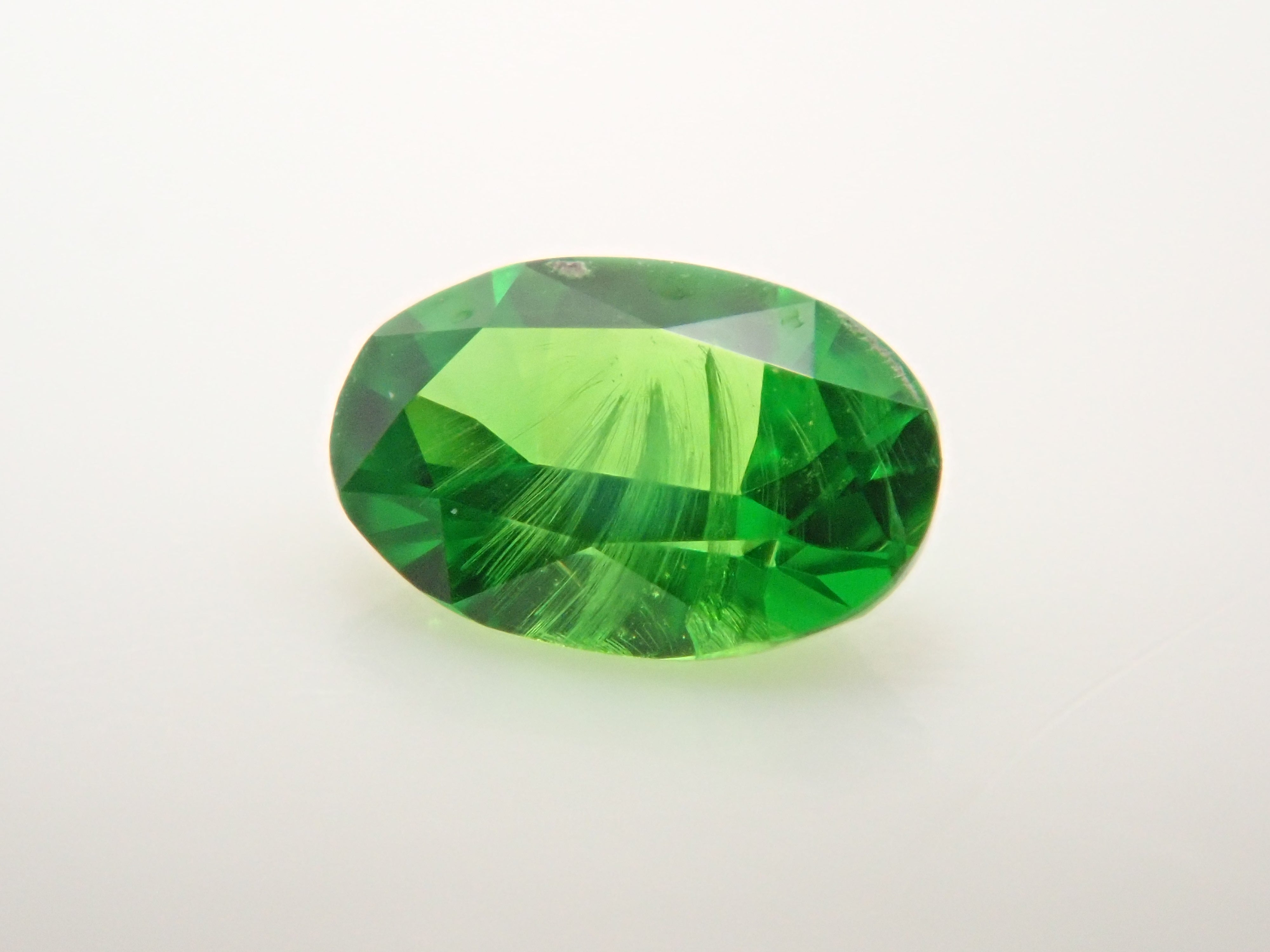 [12560895] Russian Demantoid Garnet (Horsetail) 0.067ct Loose Stone