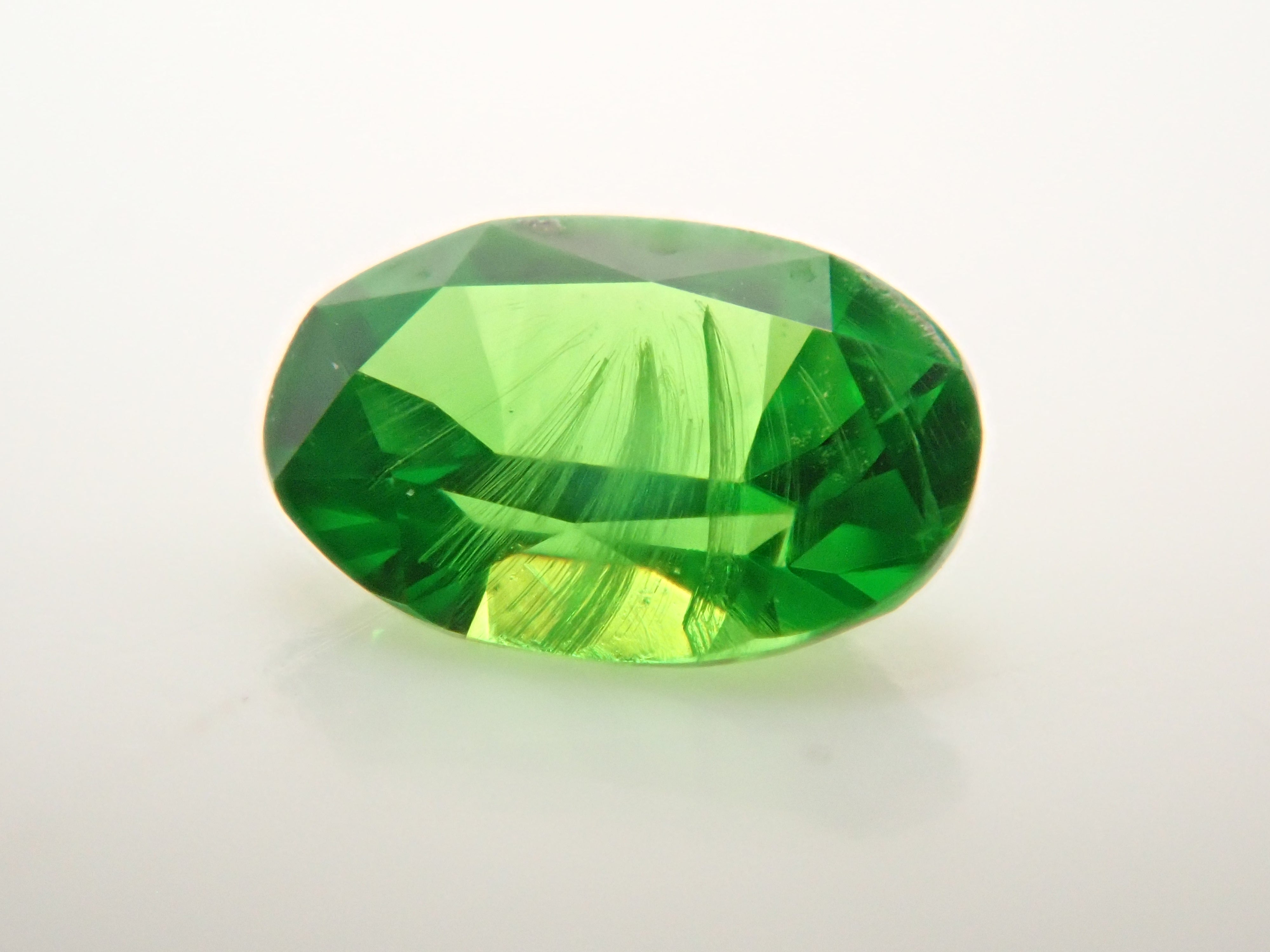 [12560895] Russian Demantoid Garnet (Horsetail) 0.067ct Loose Stone