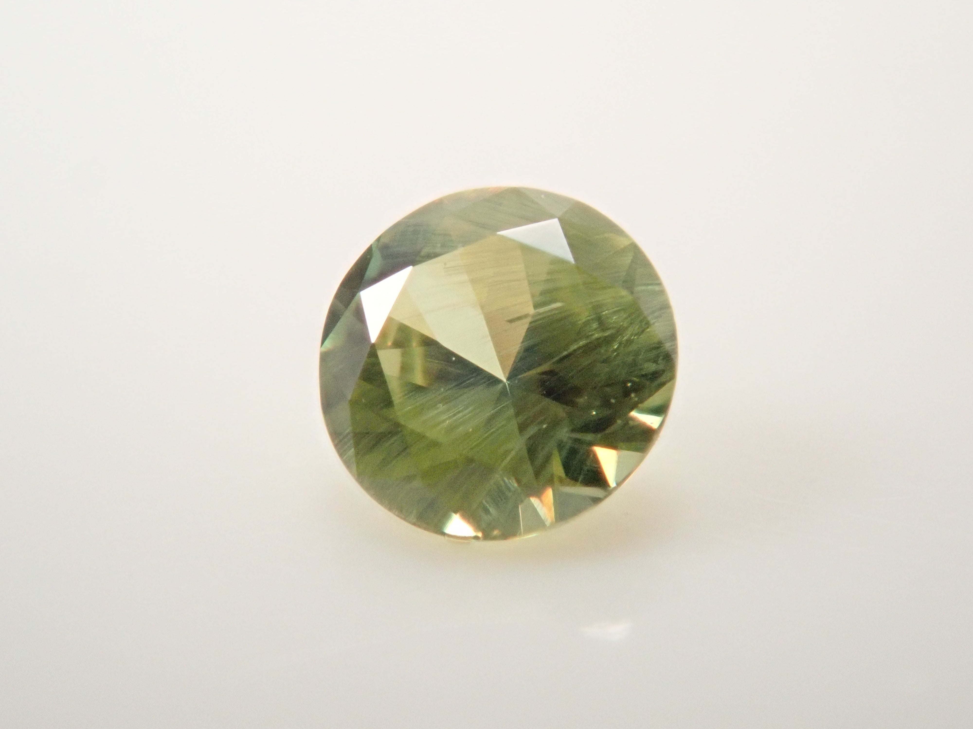 [12560905] Russian Demantoid Garnet (Horsetail) 0.075ct Loose Stone