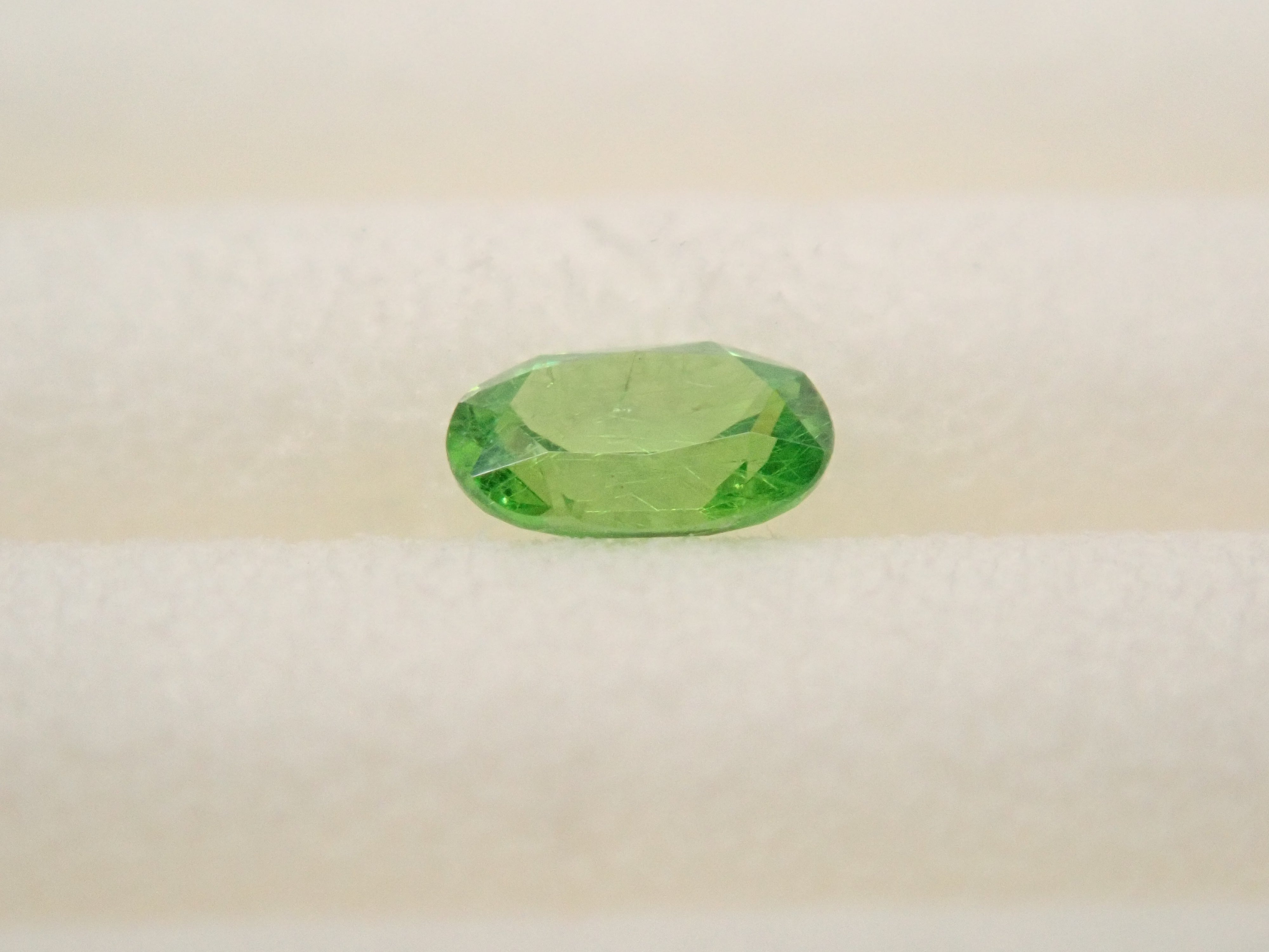 天然石　デマントイドガーネット ロシア産デマントイドガーネット（ホーステール認む） 0.064ctルース