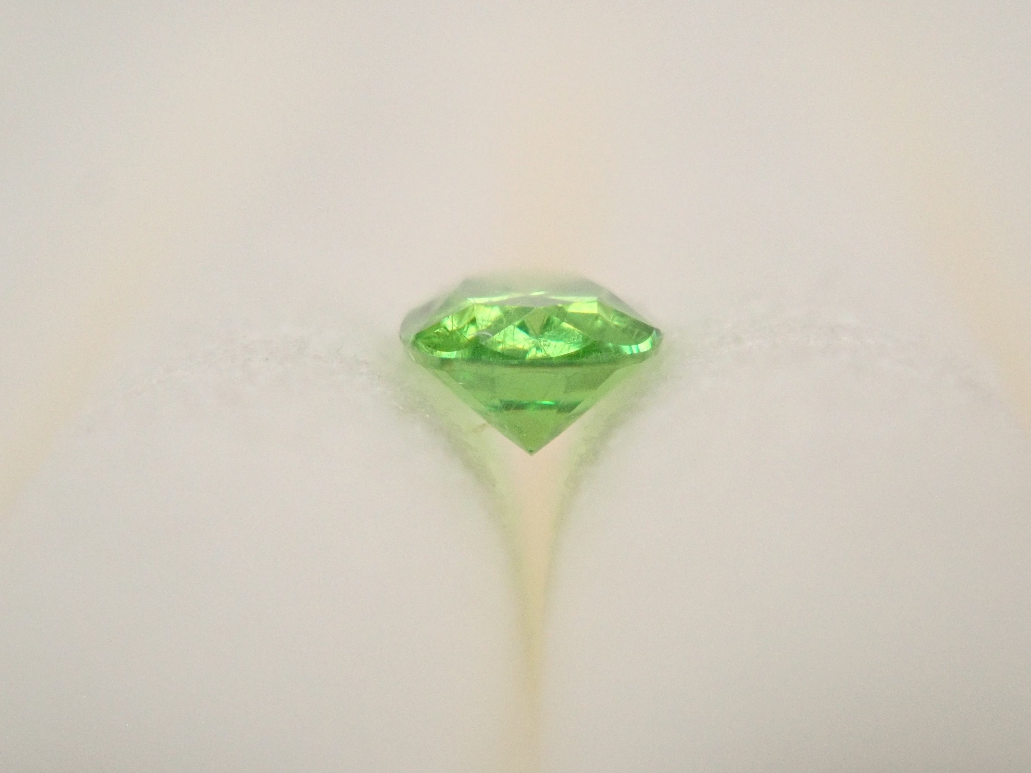 ロシア産デマントイドガーネット（ホーステール認む） 0.064ctルース