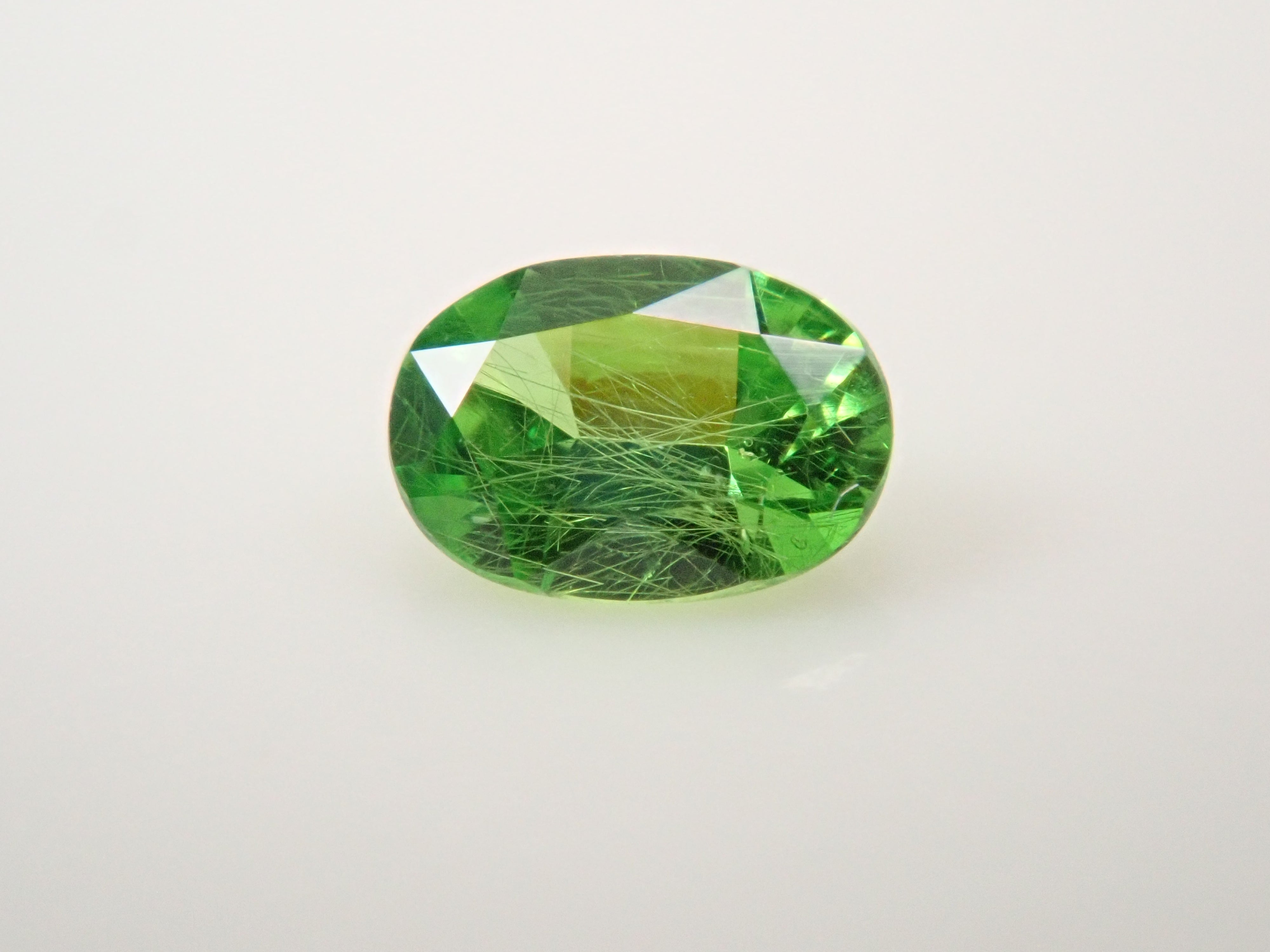 ロシア産デマントイドガーネット（ホーステール認む） 0.064ctルース