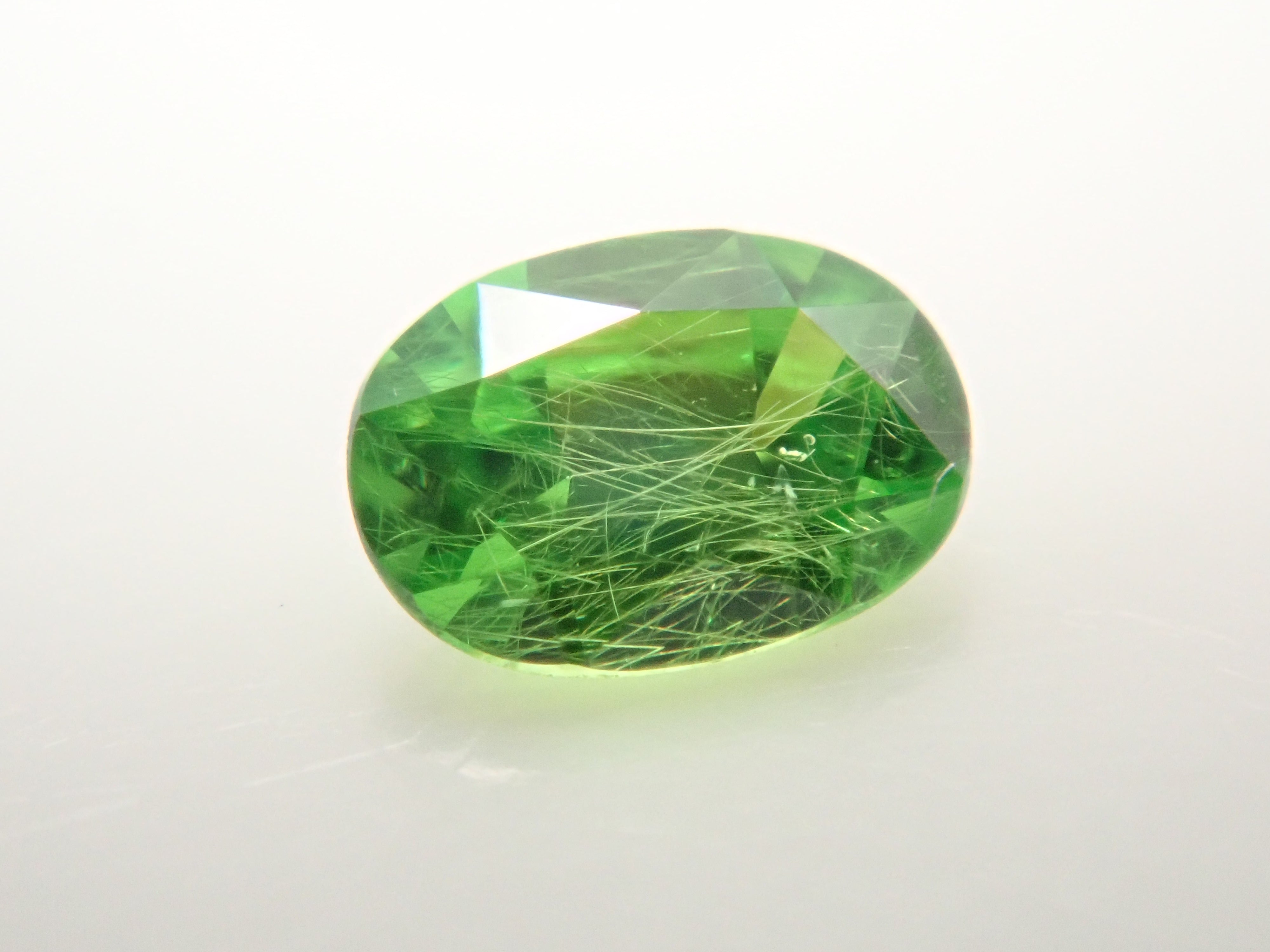 ロシア産デマントイドガーネット（ホーステール認む） 0.064ctルース