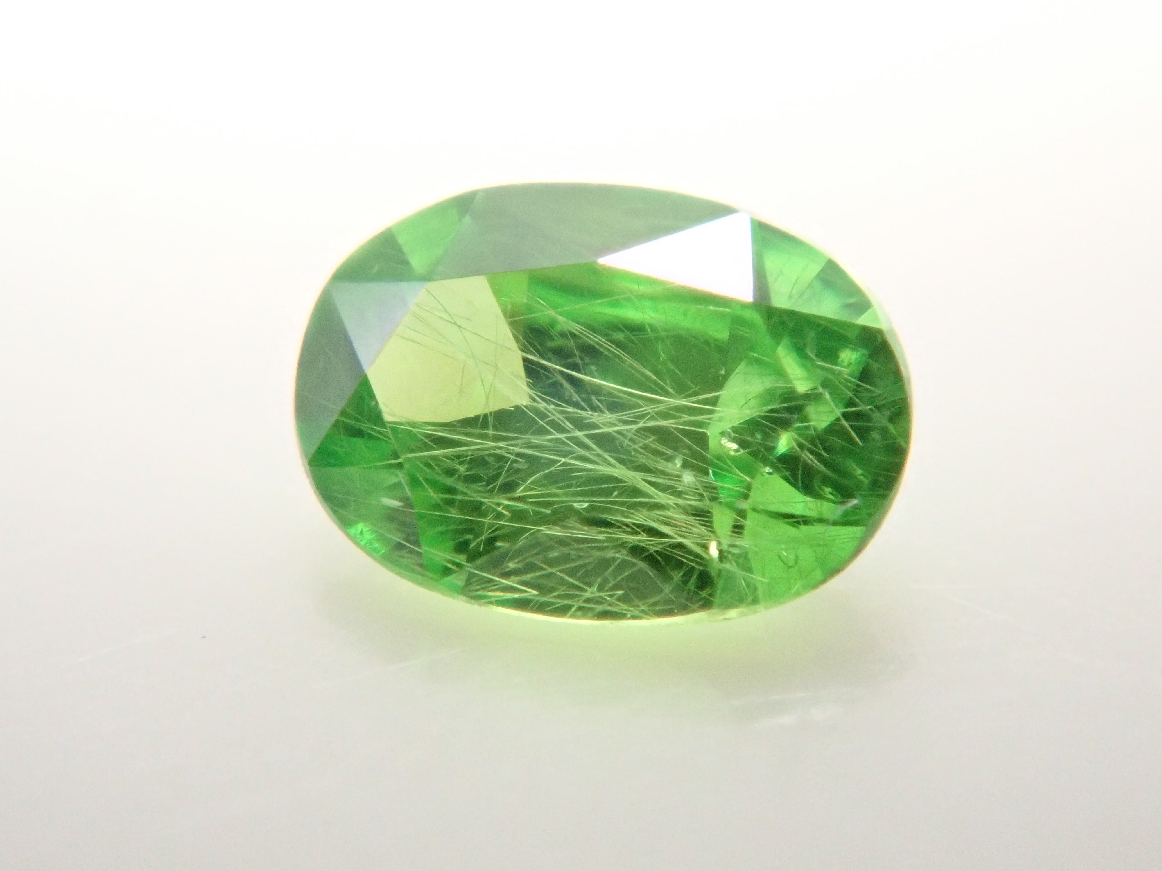 ロシア産デマントイドガーネット（ホーステール認む） 0.064ctルース