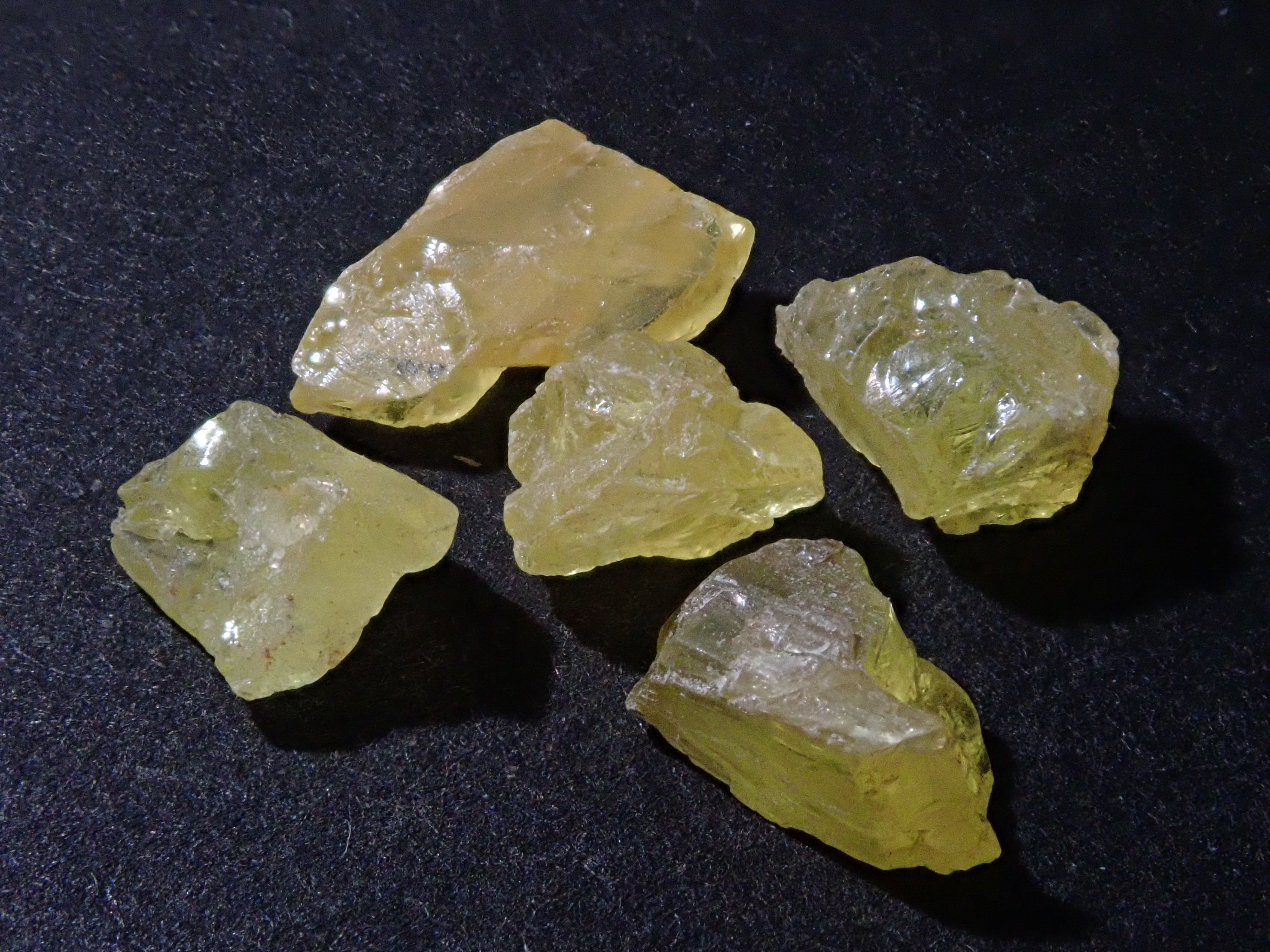 Set of 2 stones: 1 YAG (yttrium aluminum garnet) stone (canary yellow, emerald cut) + 1 yellow sapphire rough stone (discount available for multiple purchases)