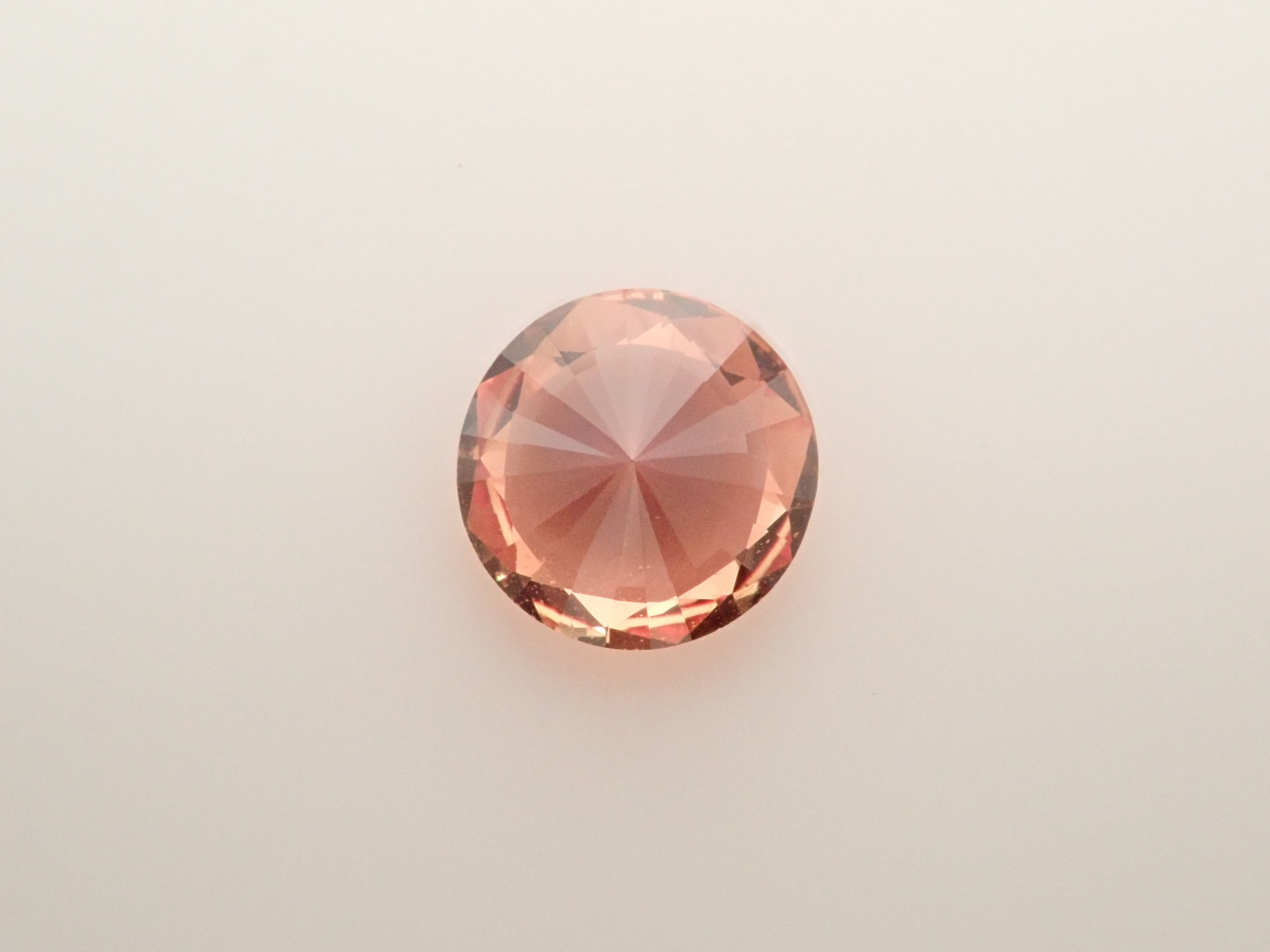 【抽選販売：10/31(金)10時am〆】マダガスカル産パパラチアサファイア 5.6mm/0.768ctルース 中央宝石研究所