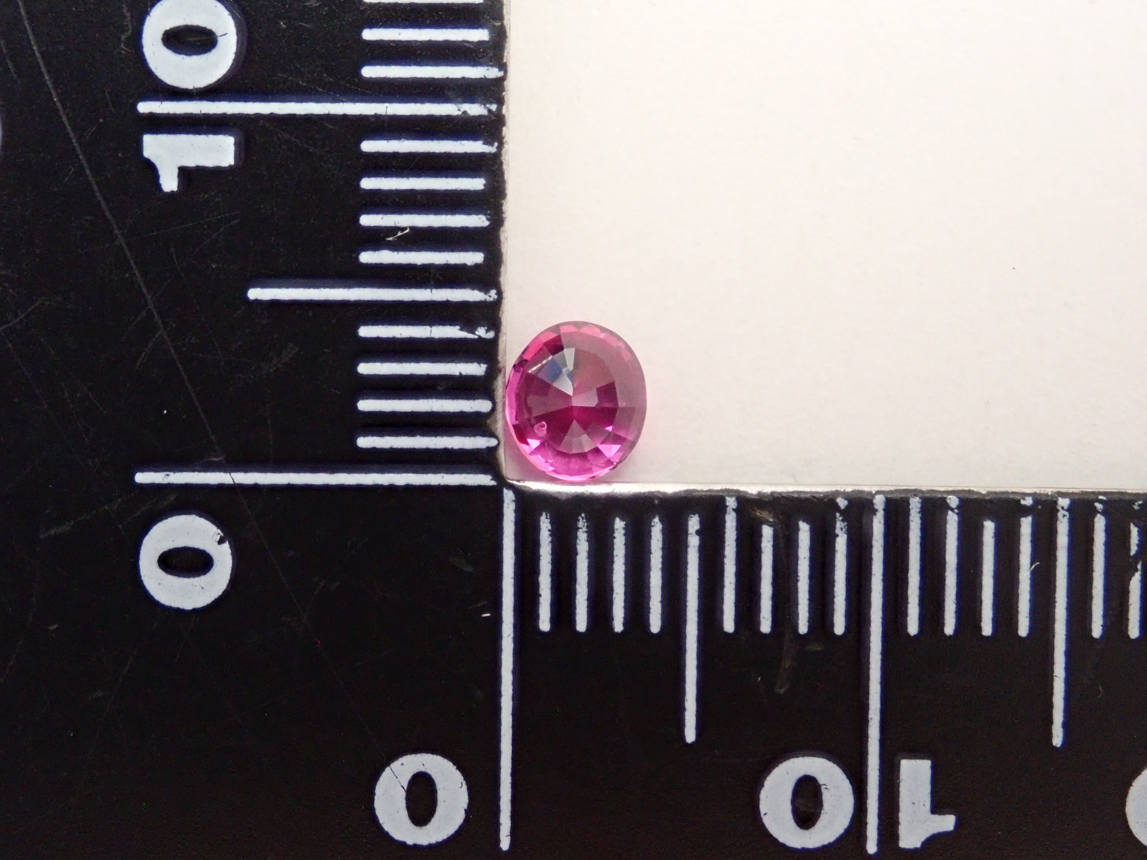 タンザニア産バイカラーサファイア 0.486ctルース