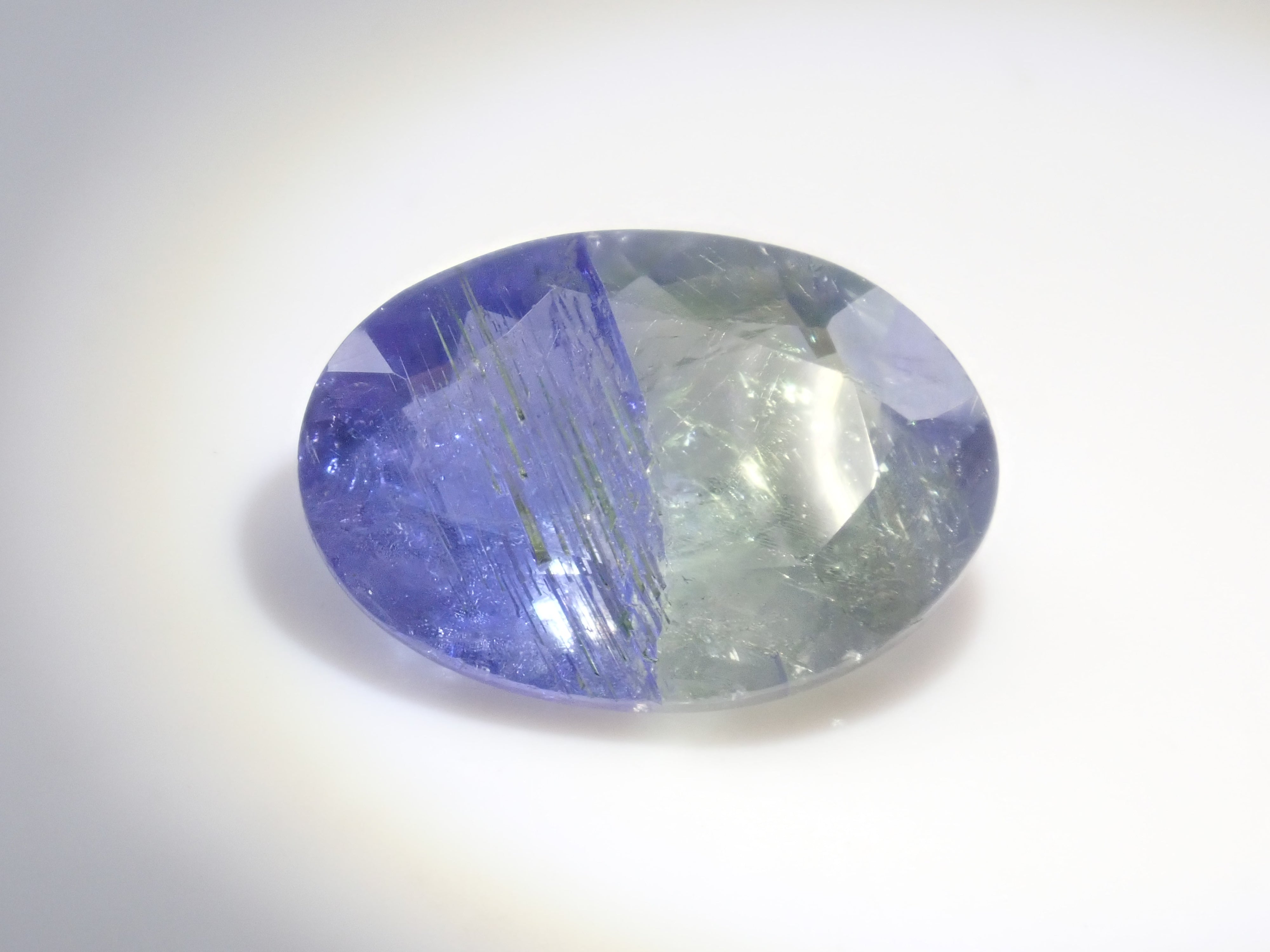 [12560872] Bicolor Tanzanite 6.351ct Loose Stone