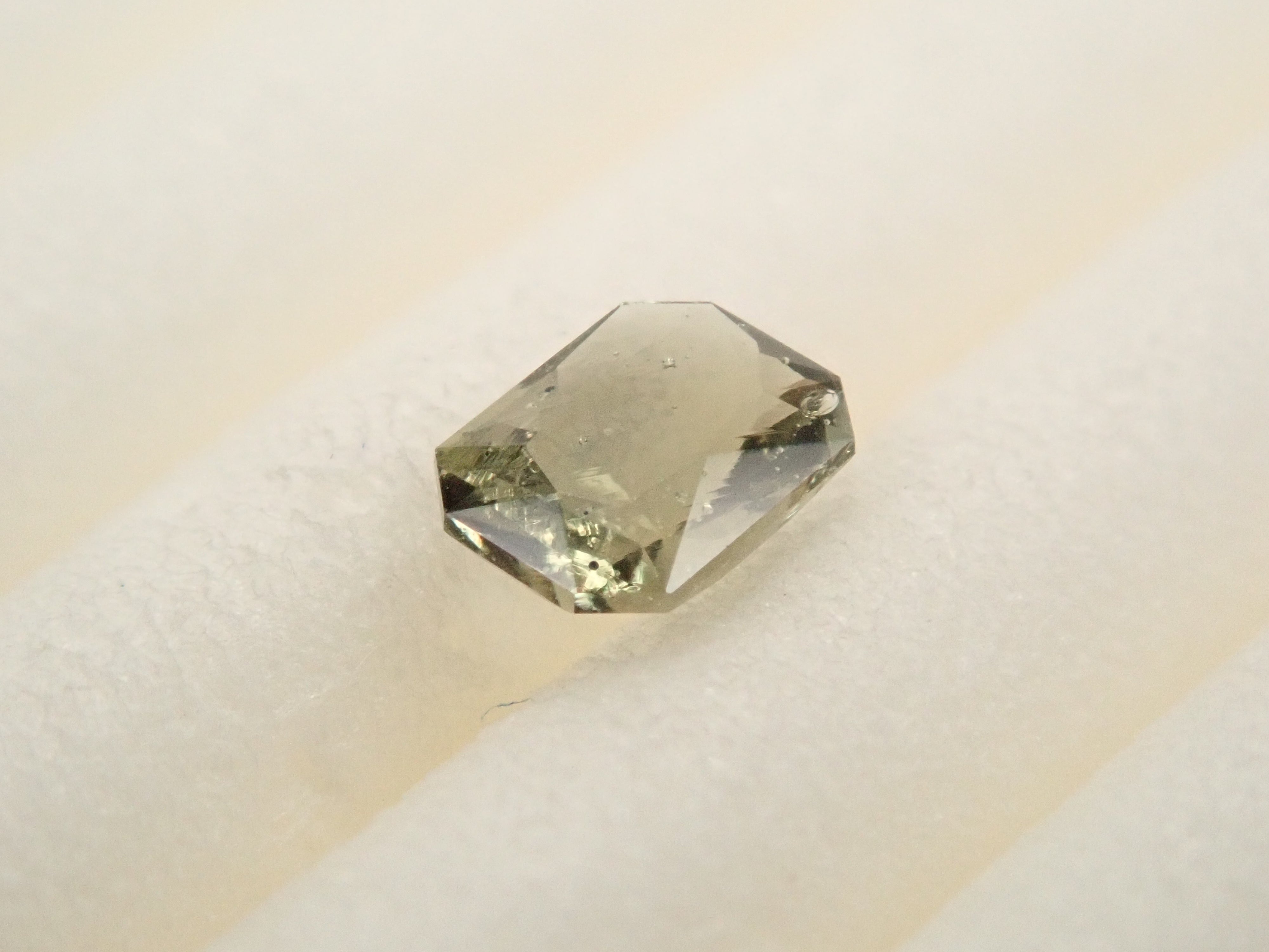 [12558144] Moldavite 0.097ct loose stone from the former Czechoslovakia