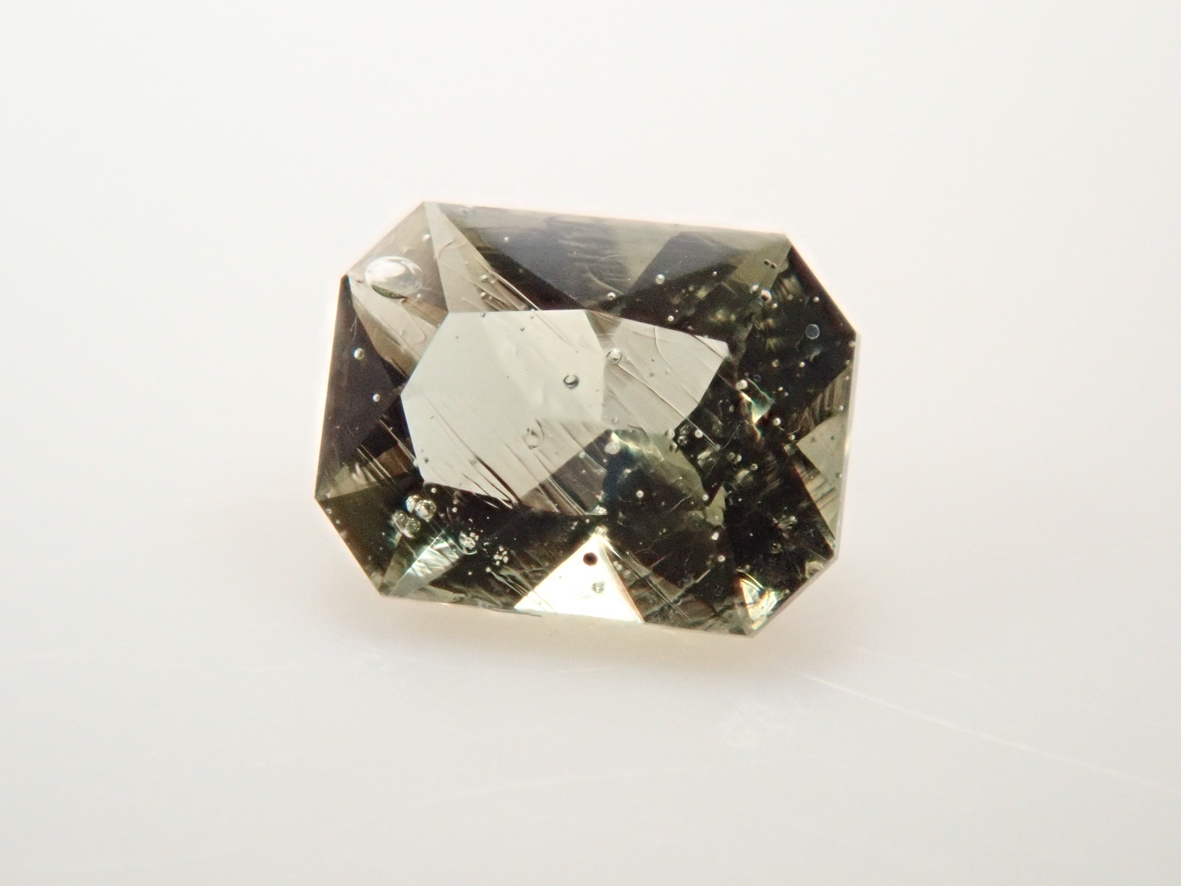 [12558144] Moldavite 0.097ct loose stone from the former Czechoslovakia