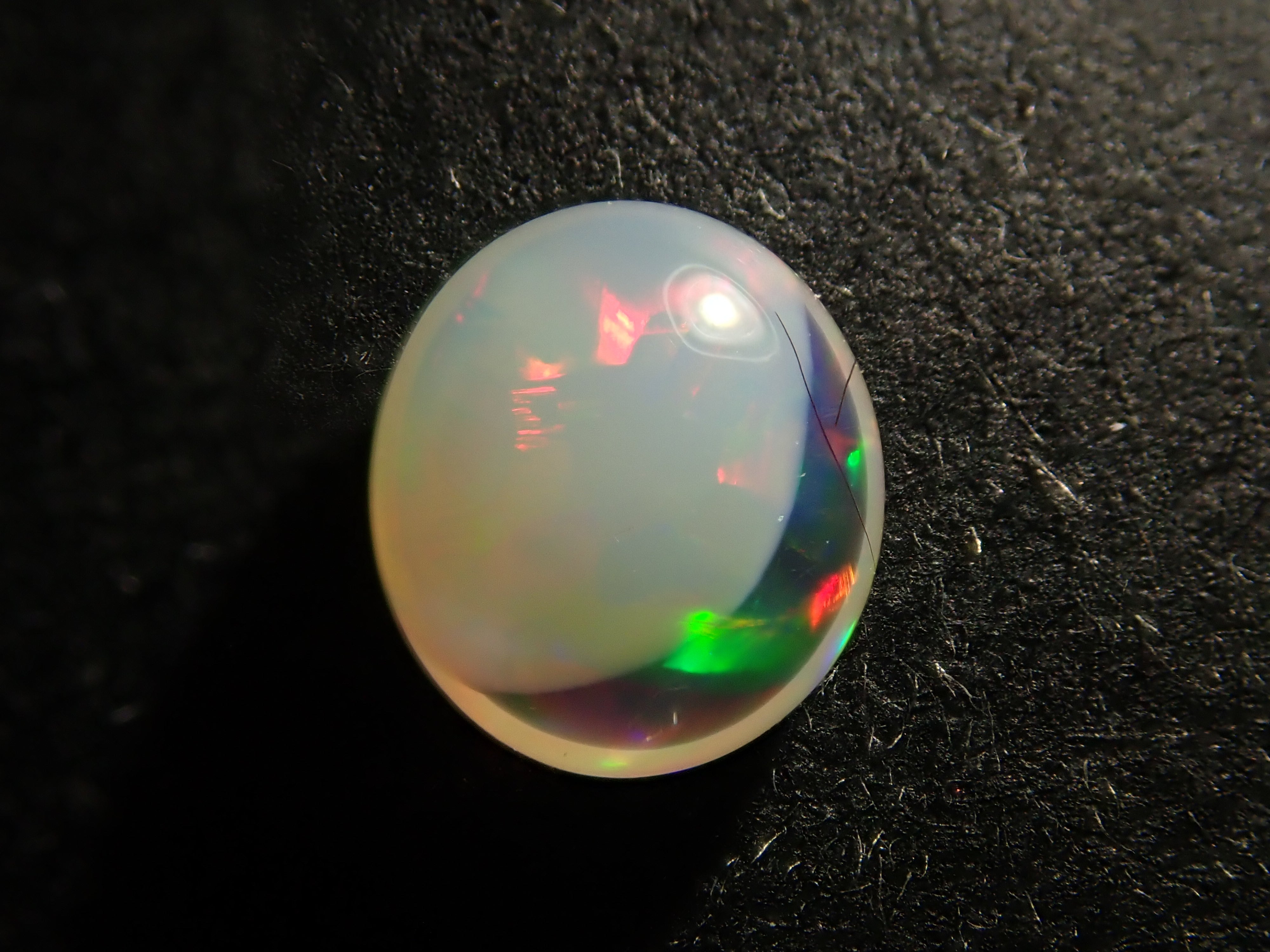 [12561472] Mexican egg-in opal 0.381ct loose stone