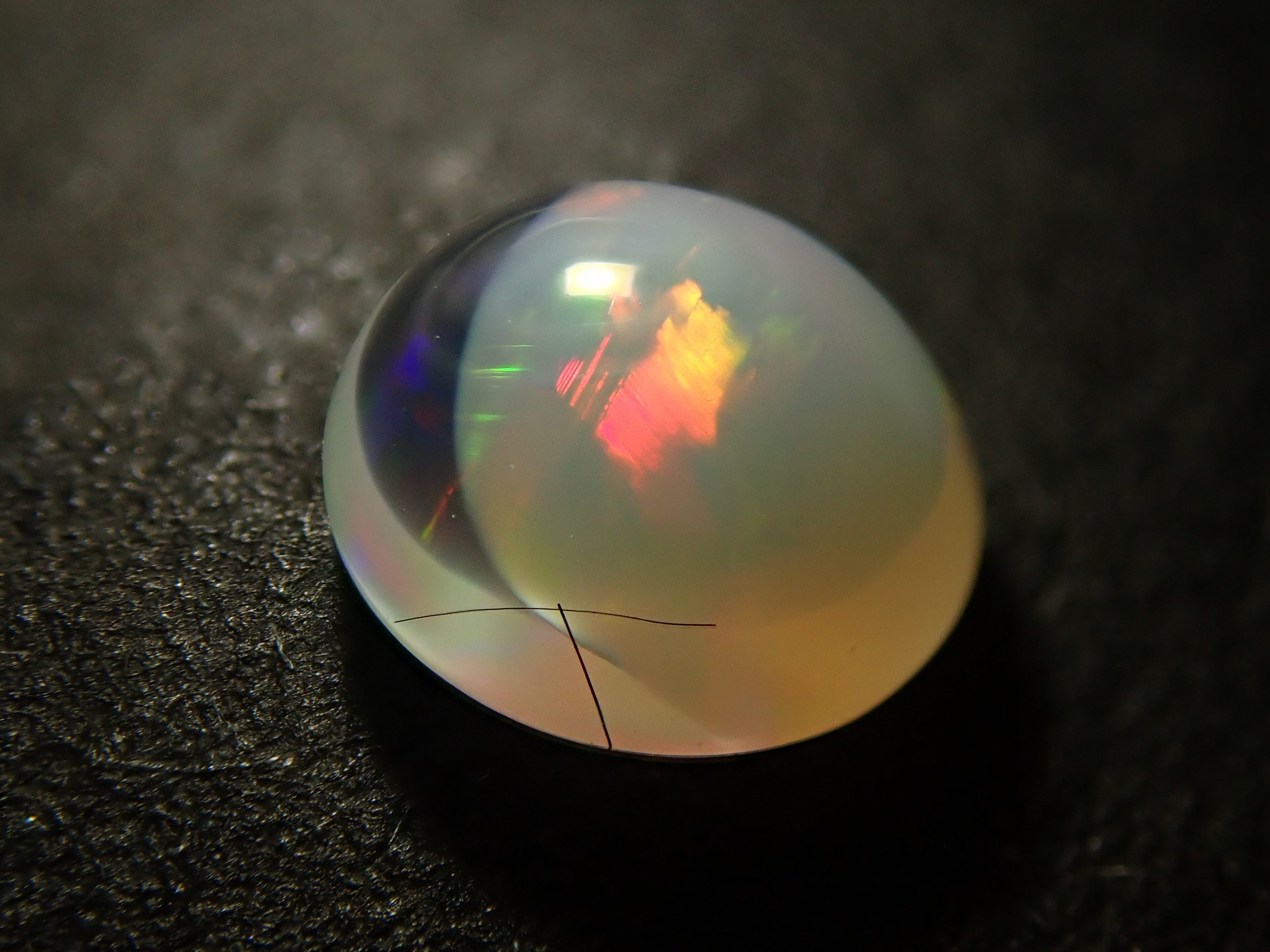 [12561472] Mexican egg-in opal 0.381ct loose stone