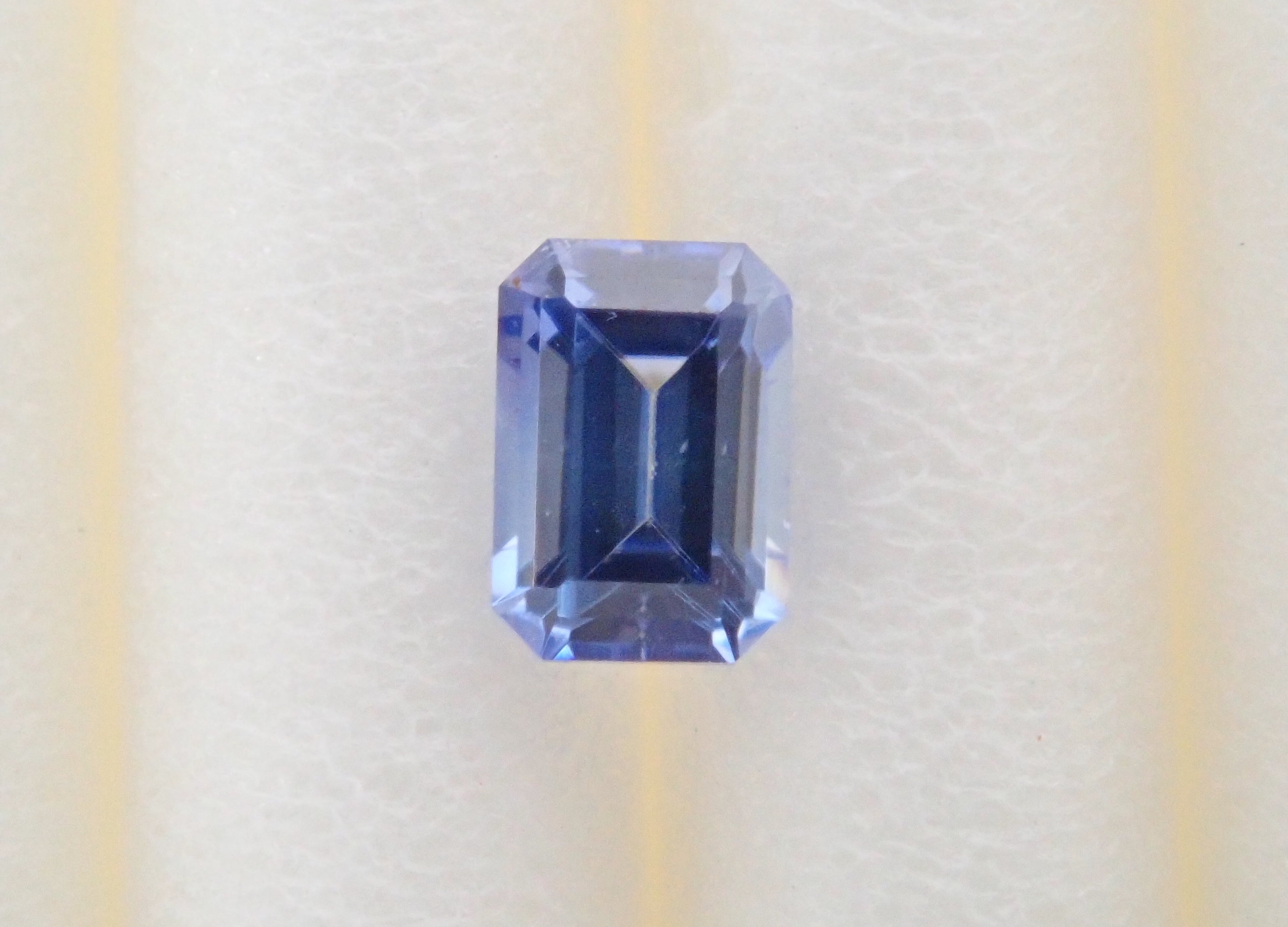 Benitoite 0.107ct loose (emerald cut)