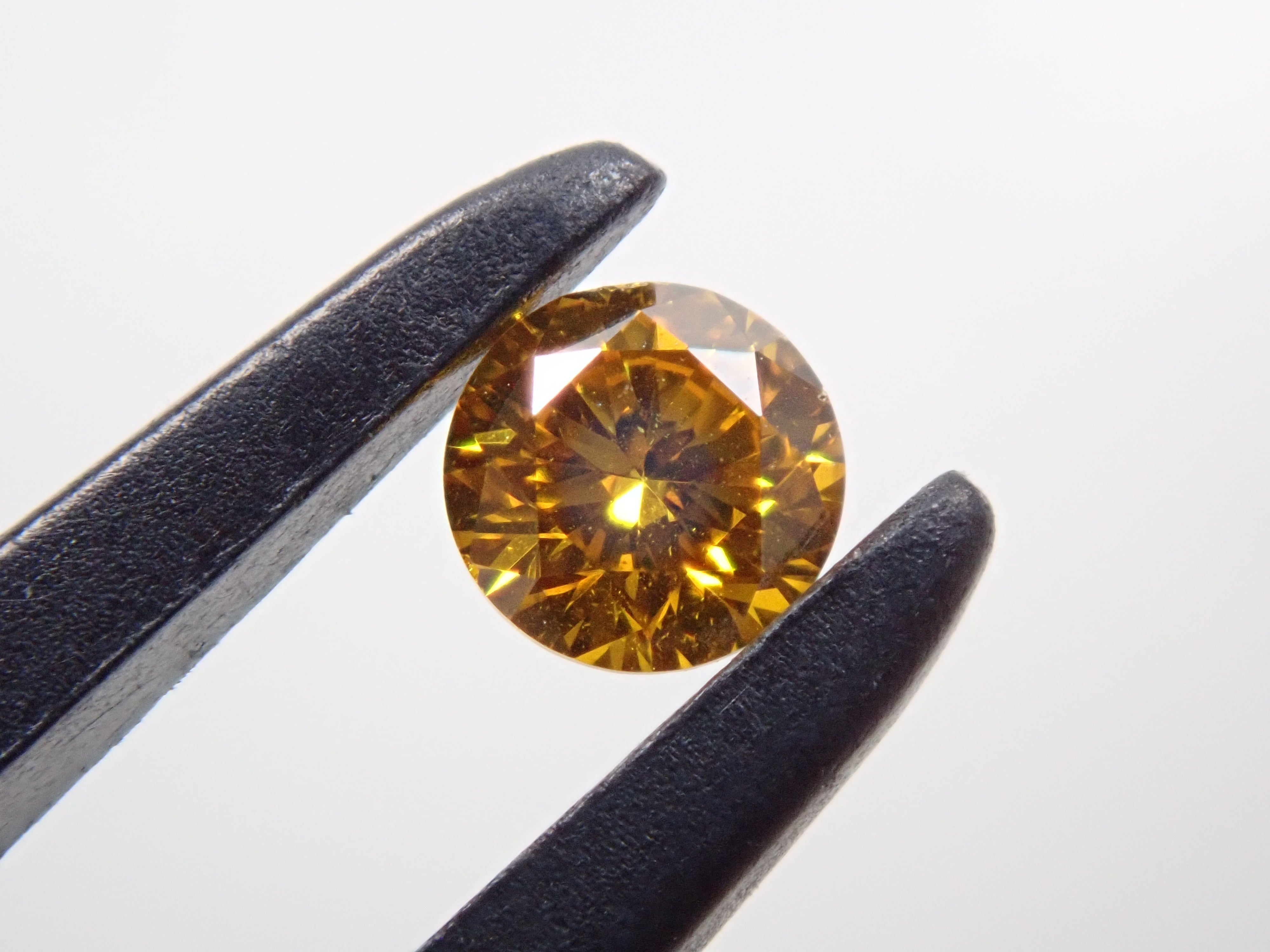 イエローダイヤモンド 3mm/0.107ctルース(FANCY VIVID ORANGY YELLOW, SI-2)