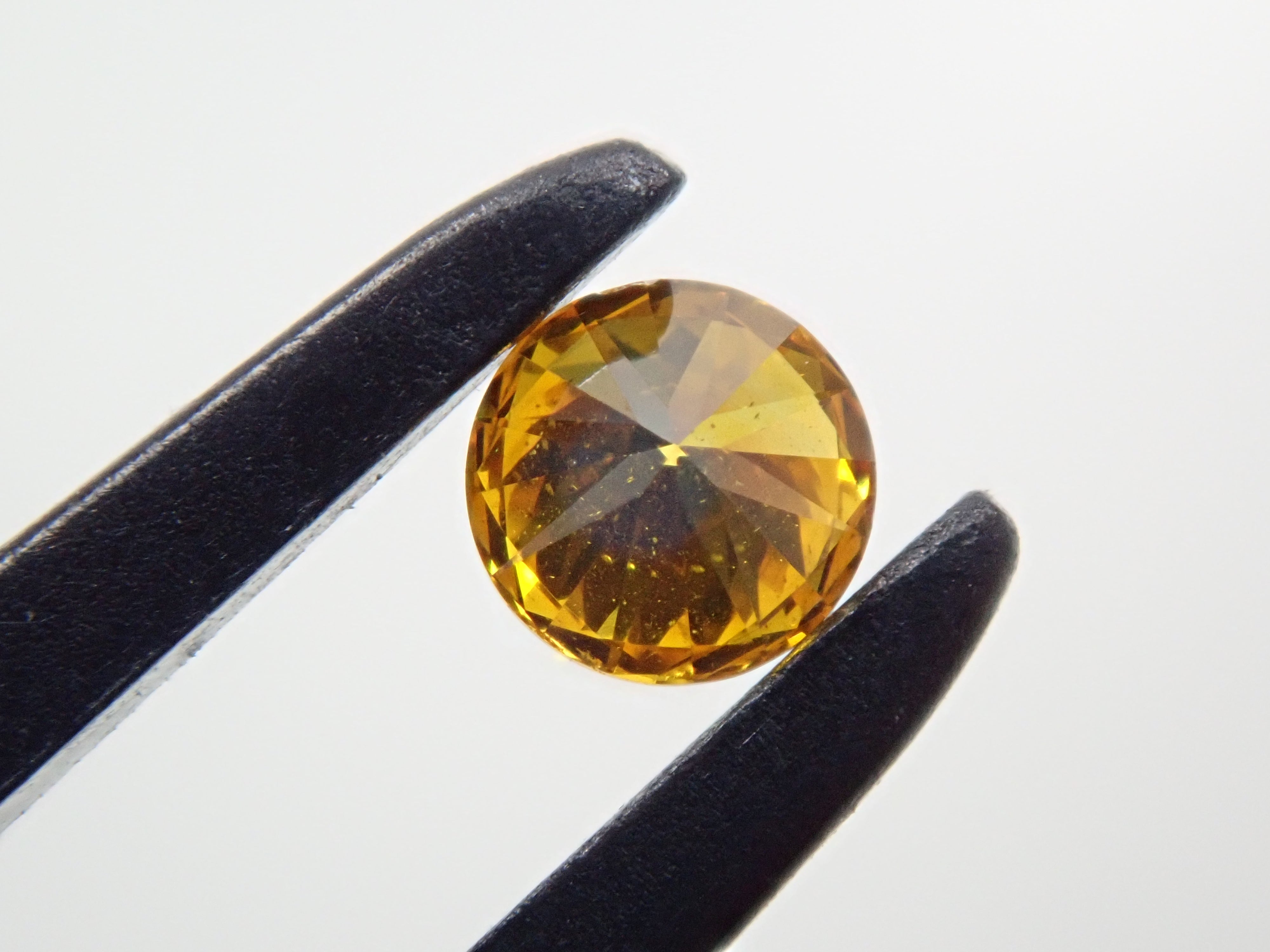 イエローダイヤモンド 3mm/0.107ctルース(FANCY VIVID ORANGY YELLOW, SI-2)