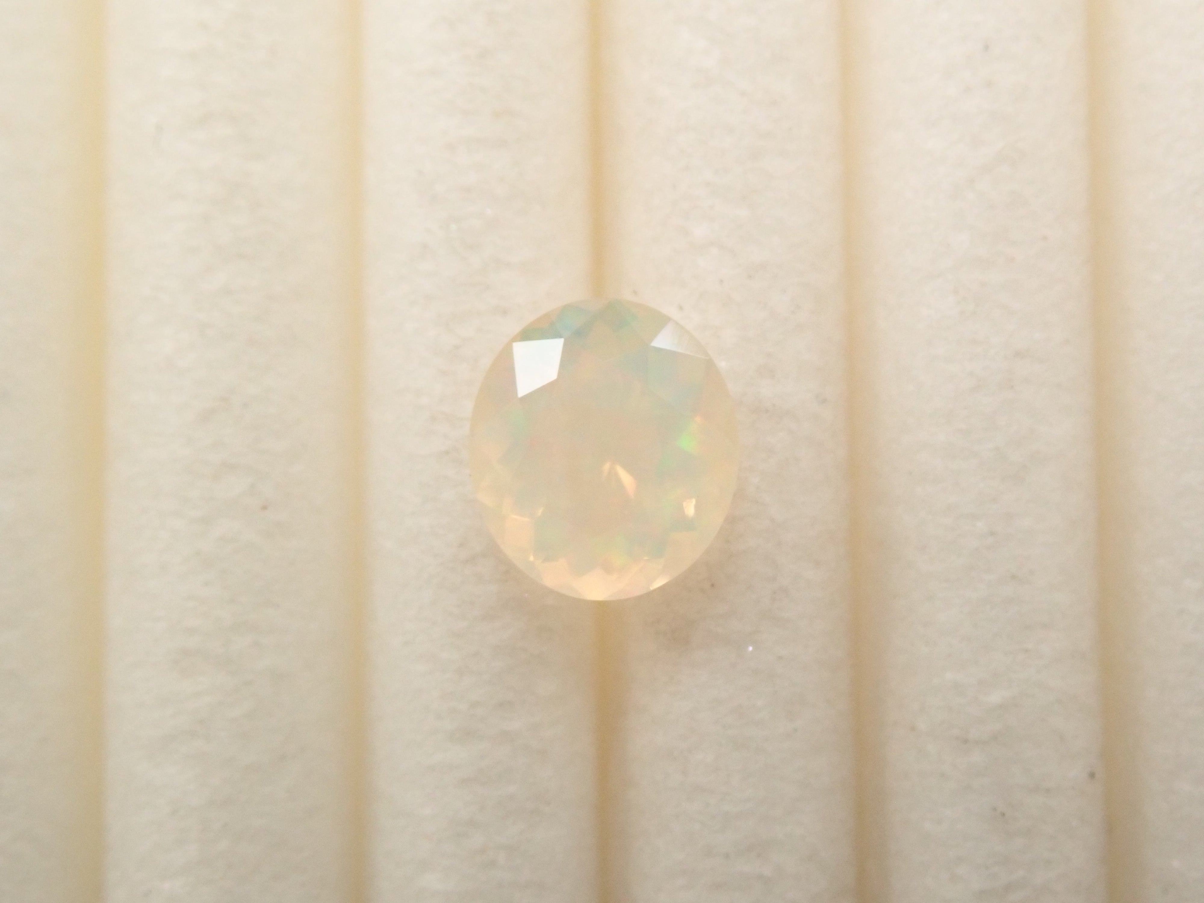 [12561479] Opal (faceted cut) 0.261ct loose stone