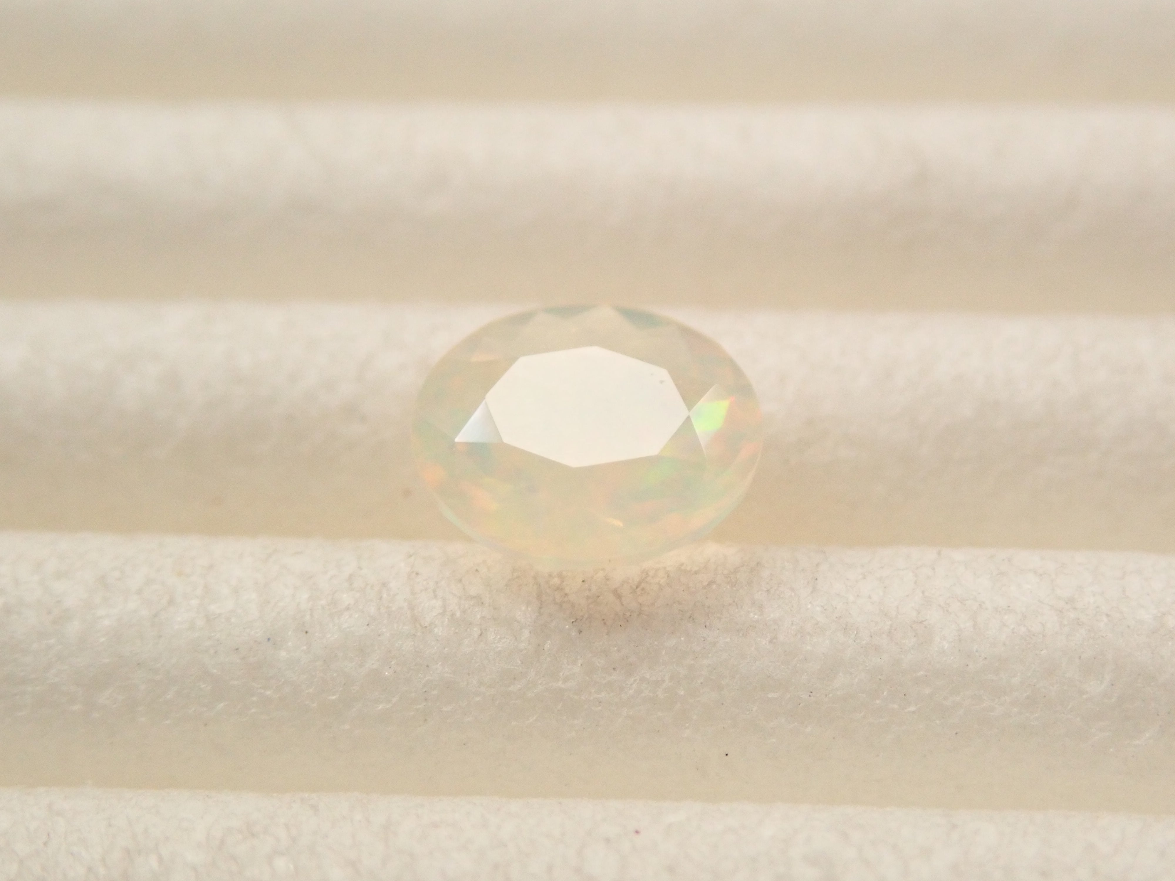 [12561479] Opal (faceted cut) 0.261ct loose stone