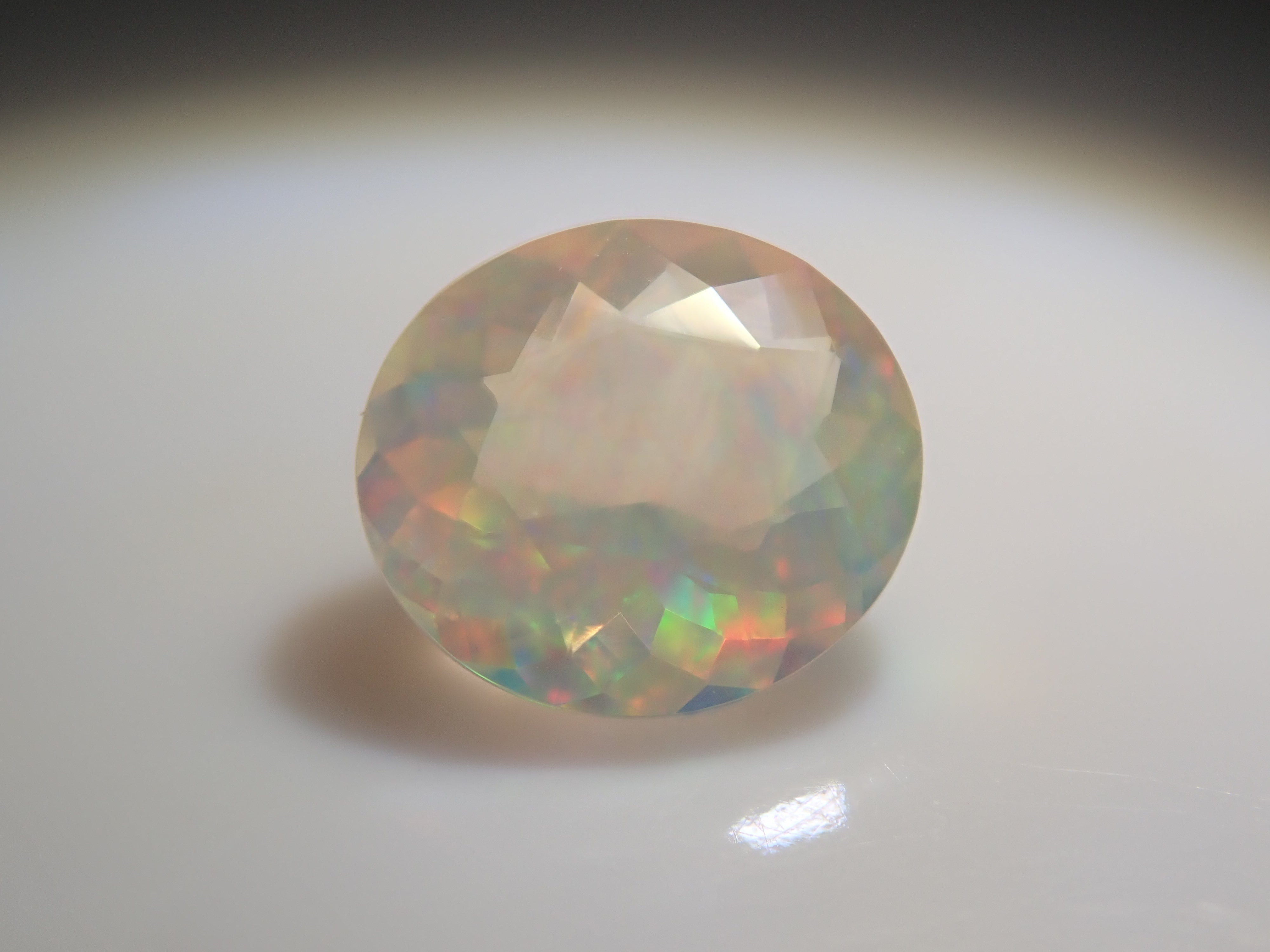 [12561479] Opal (faceted cut) 0.261ct loose stone