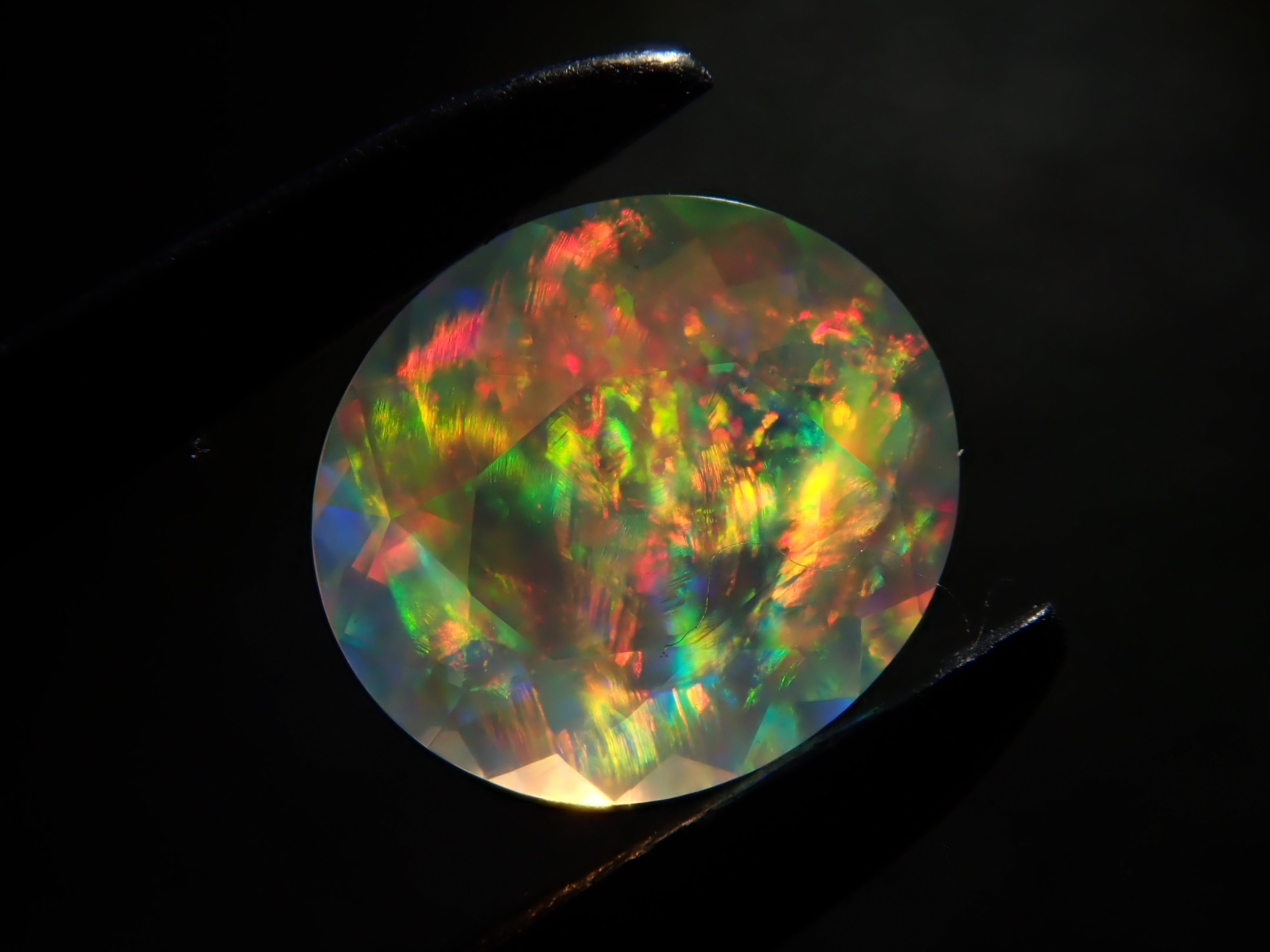[12561479] Opal (faceted cut) 0.261ct loose stone