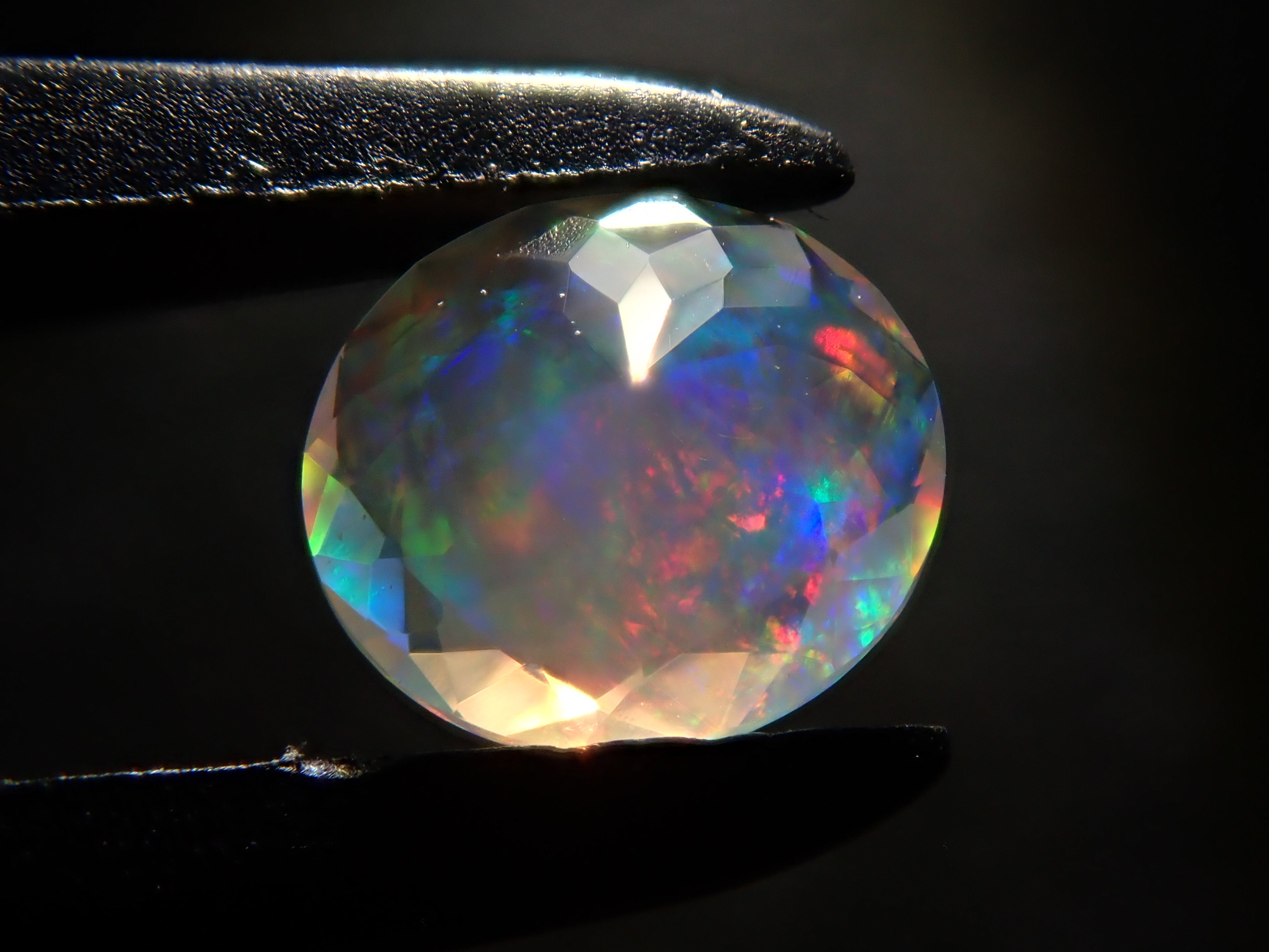 [12561479] Opal (faceted cut) 0.261ct loose stone