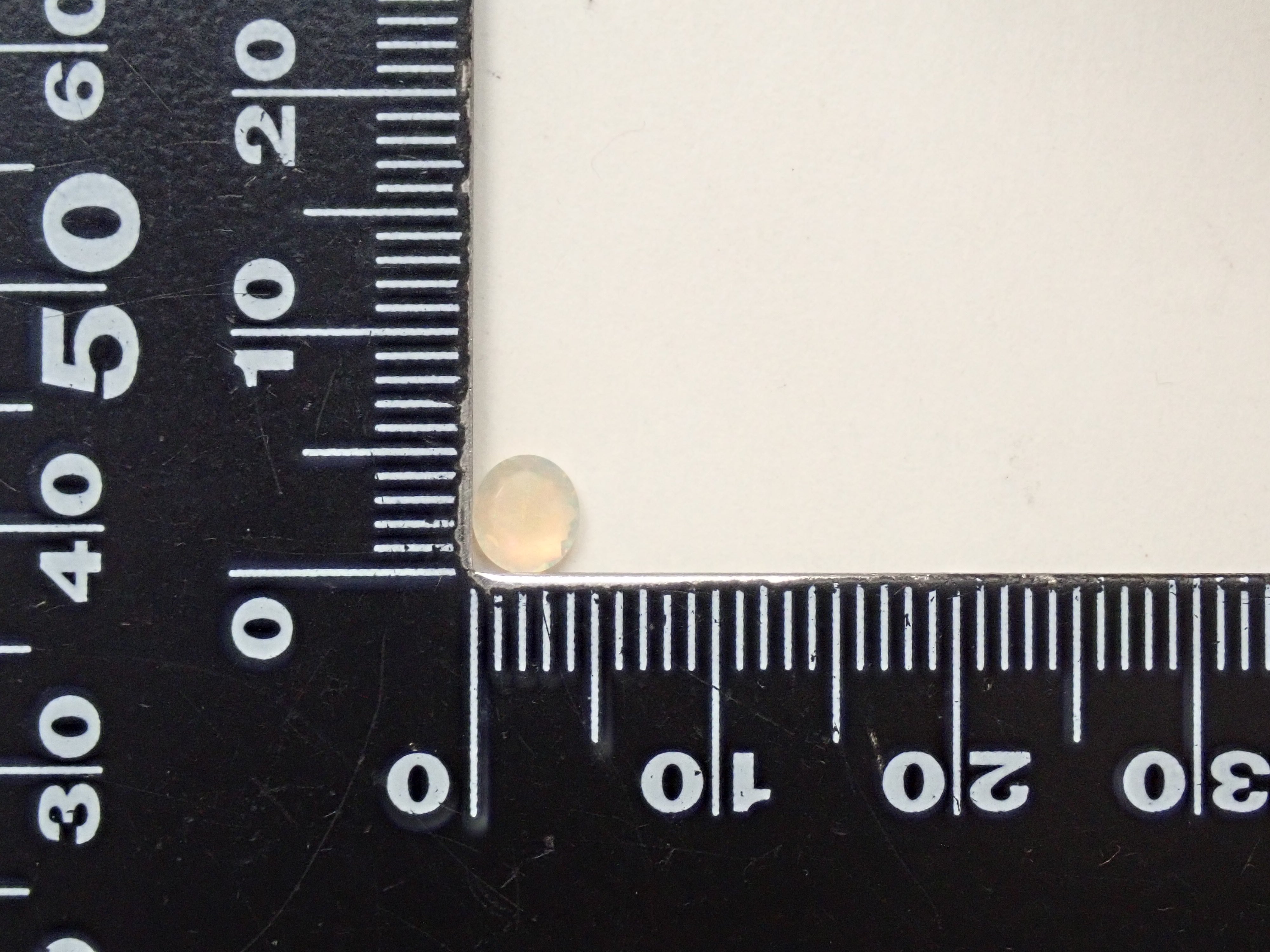 [12561479] Opal (faceted cut) 0.261ct loose stone