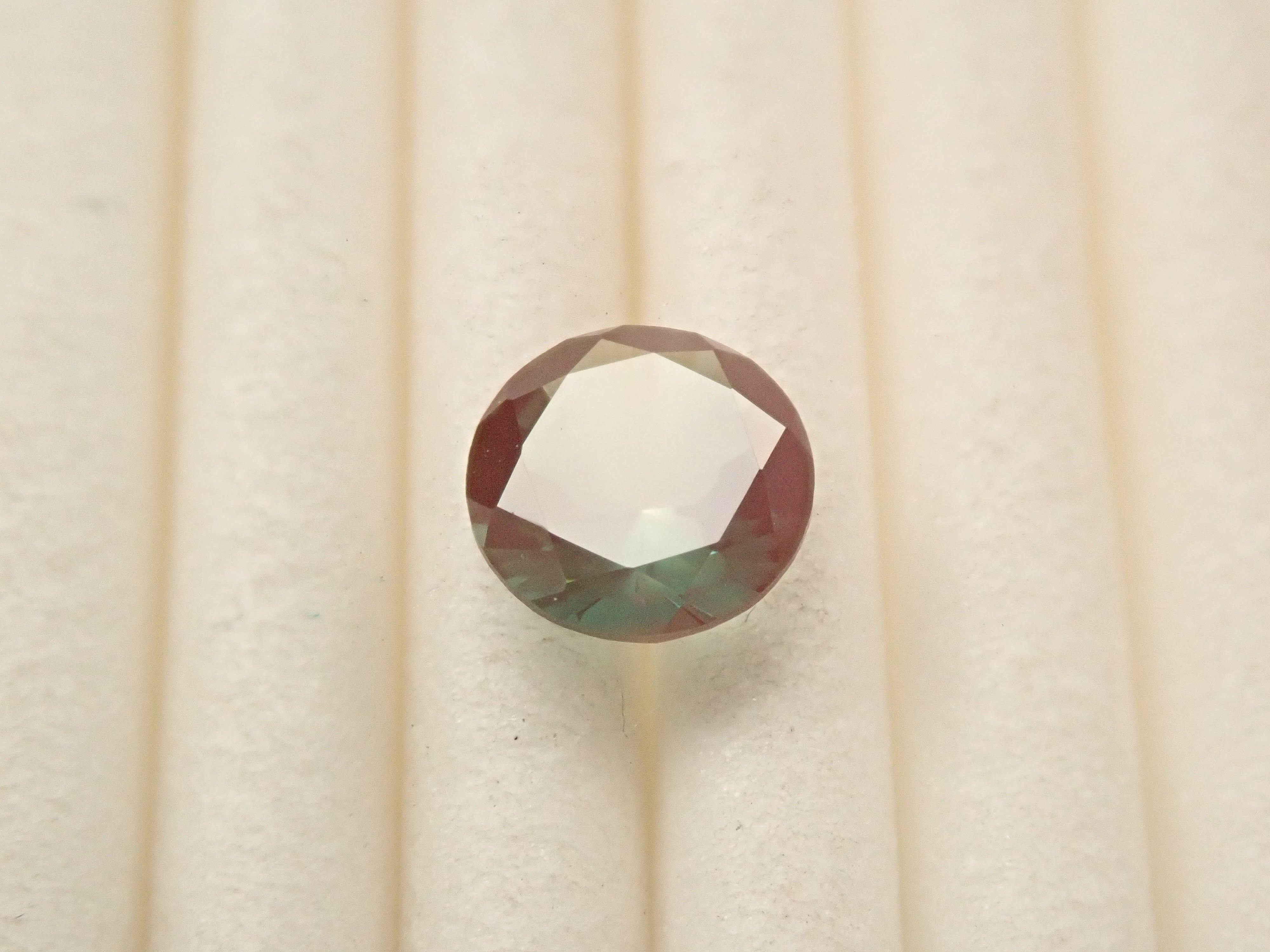 さくらインカット】モンゴル産カラーチェンジアンデシン 6.0mm/0.655ct