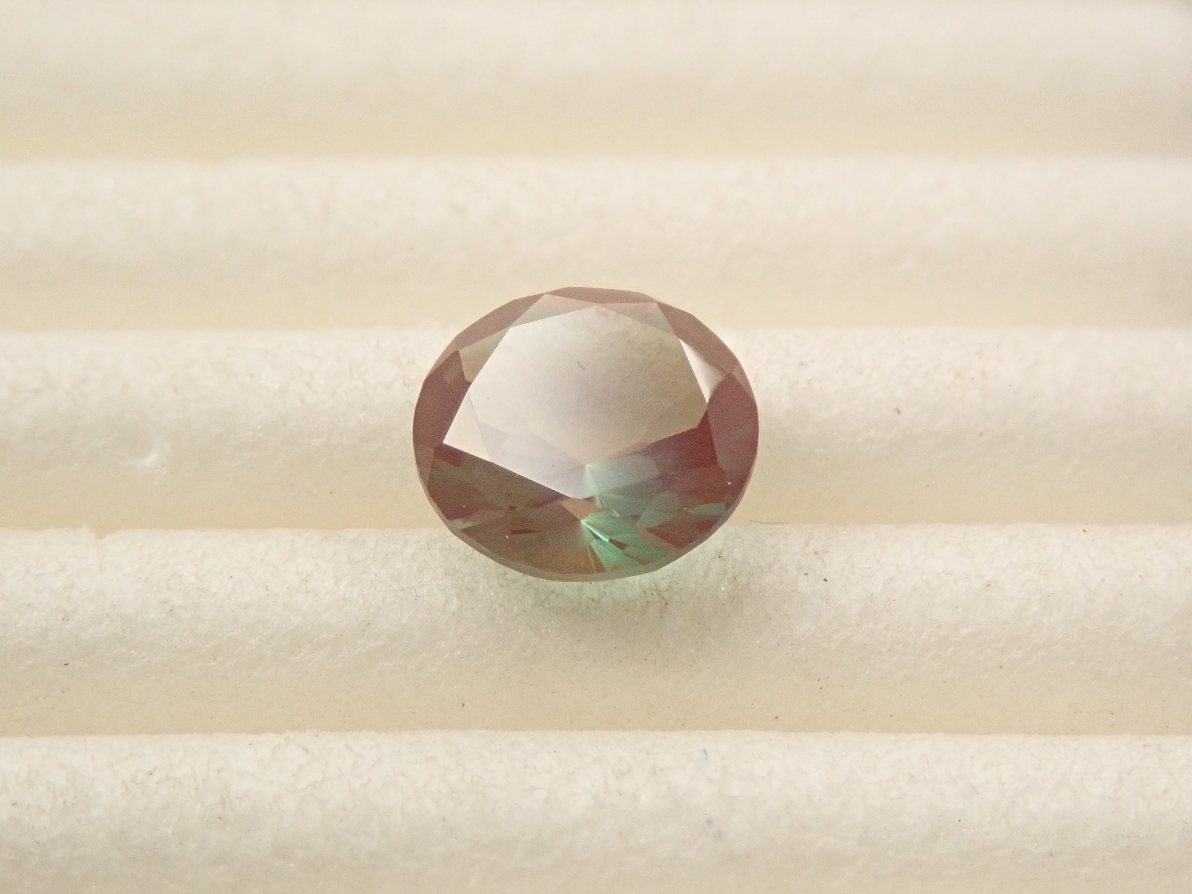 さくらインカット】モンゴル産カラーチェンジアンデシン 6.0mm/0.655ct
