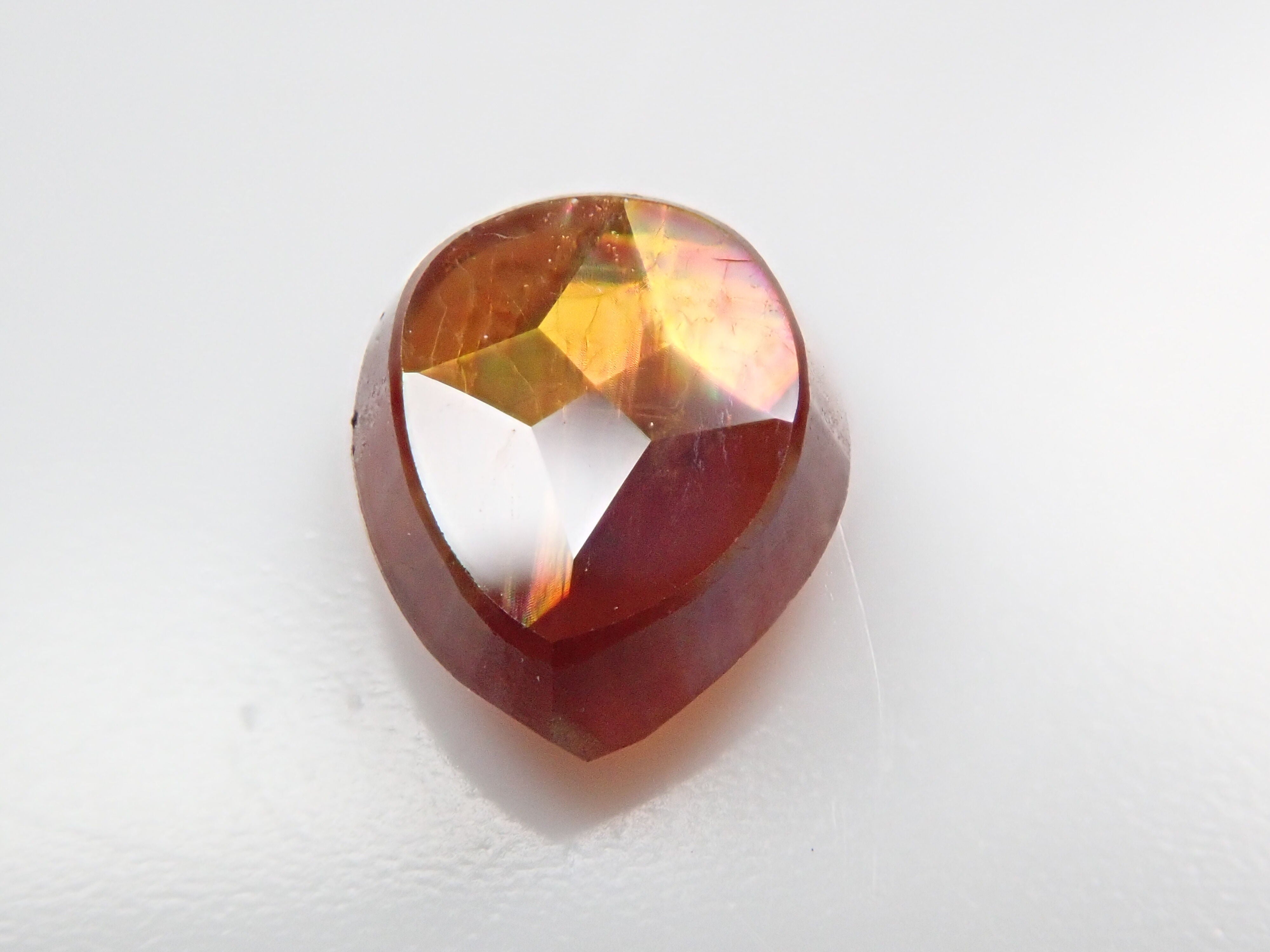 Andradite garnet (commonly known as rainbow garnet) 0.910ct rough stone