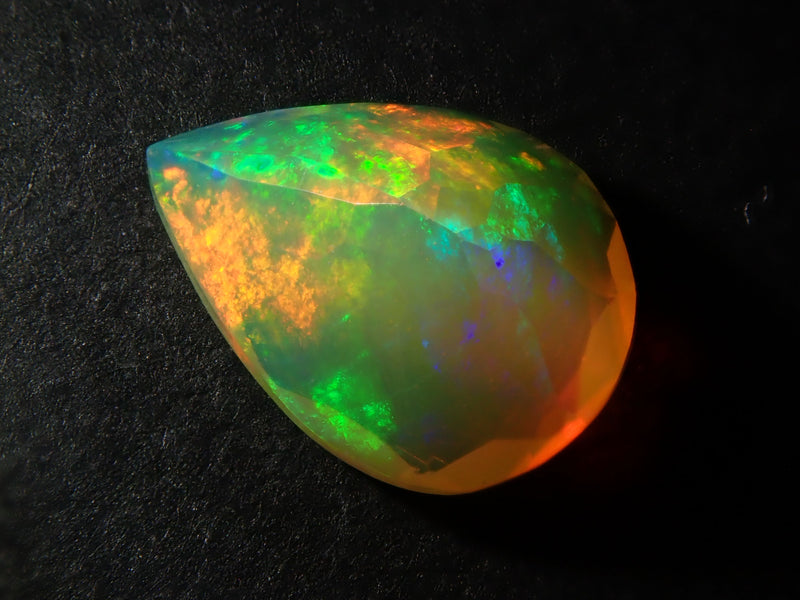 Fire opal 0.721ct loose (faceted cut)