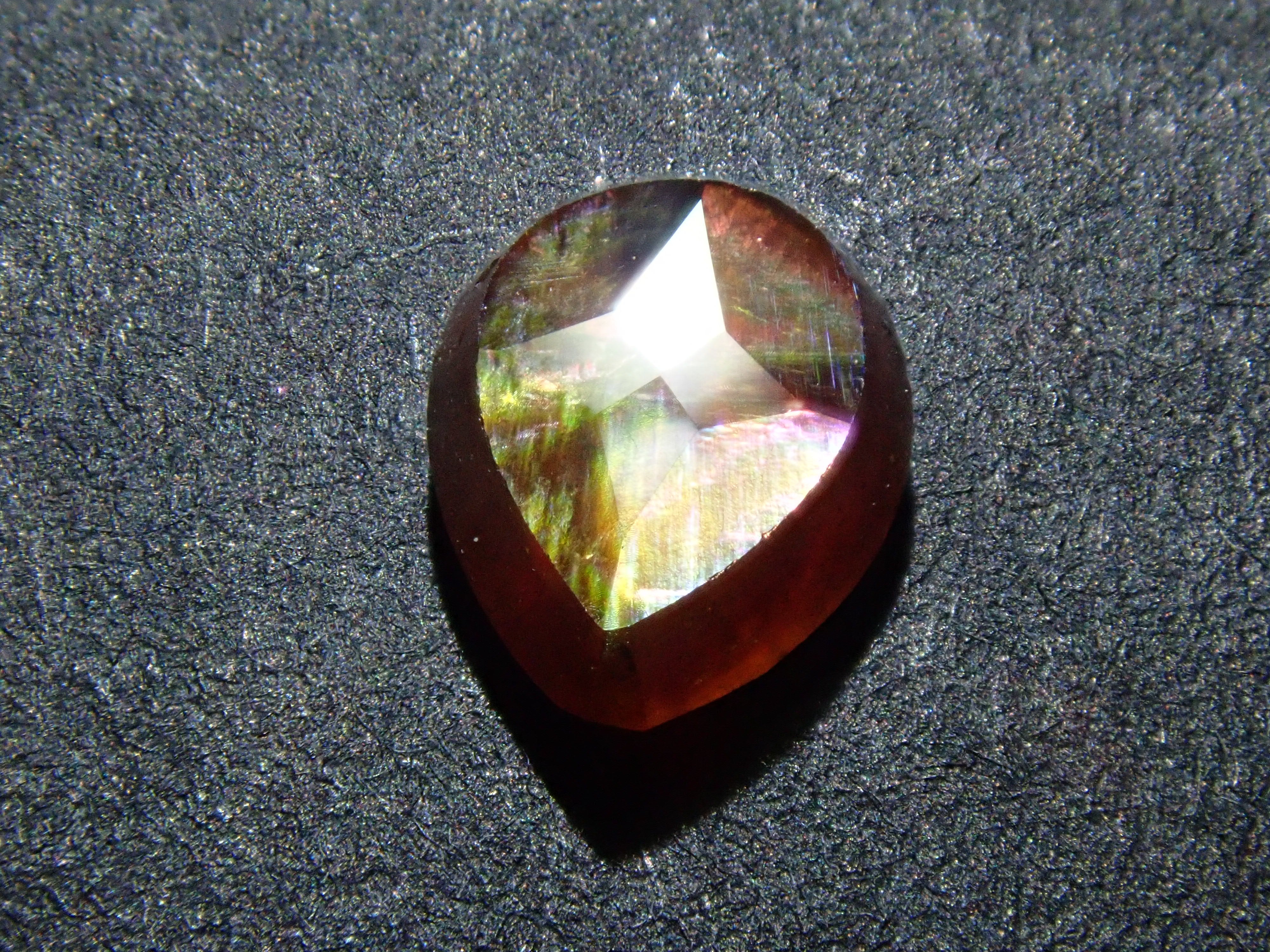 Andradite garnet (commonly known as rainbow garnet) 0.720ct rough stone