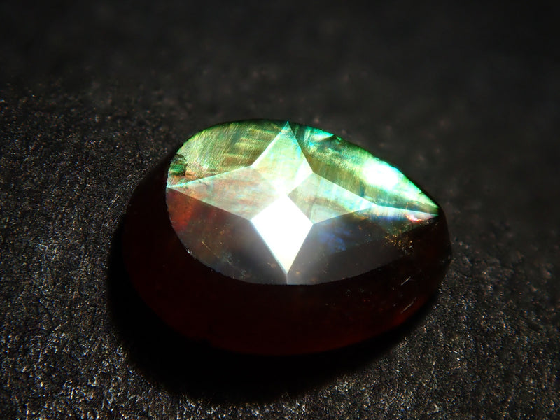 Andradite garnet (commonly known as rainbow garnet) 0.517ct rough stone